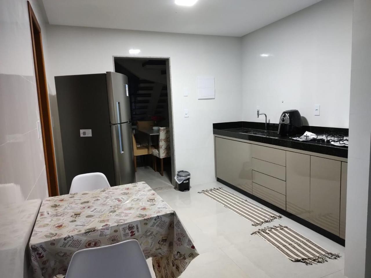Ivana Imoveis - Casa com Piscina na Praia do Morro á 2 minutos da praia