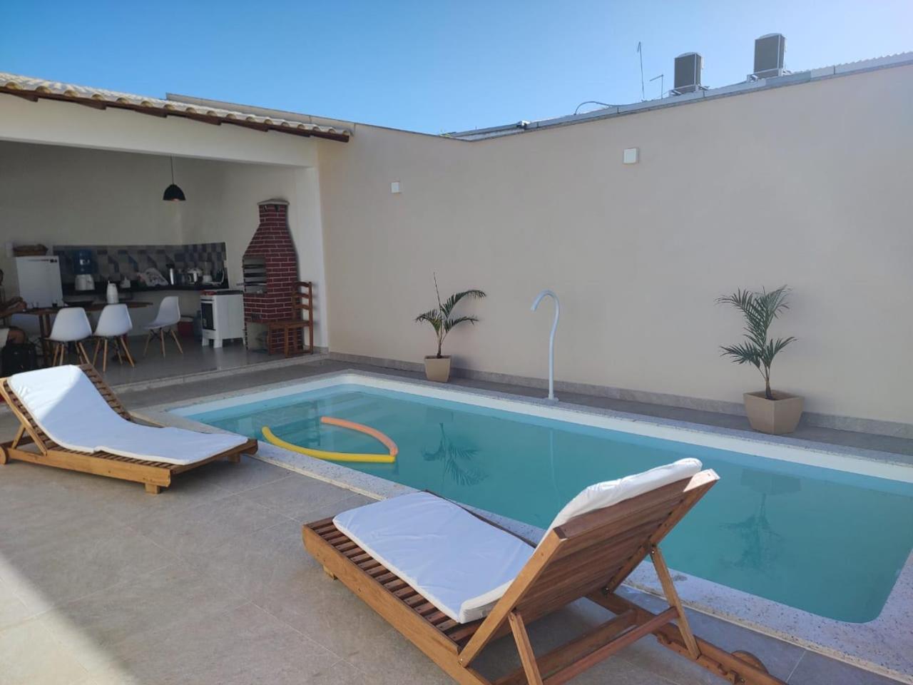 Ivana Imoveis - Casa com Piscina na Praia do Morro á 2 minutos da praia