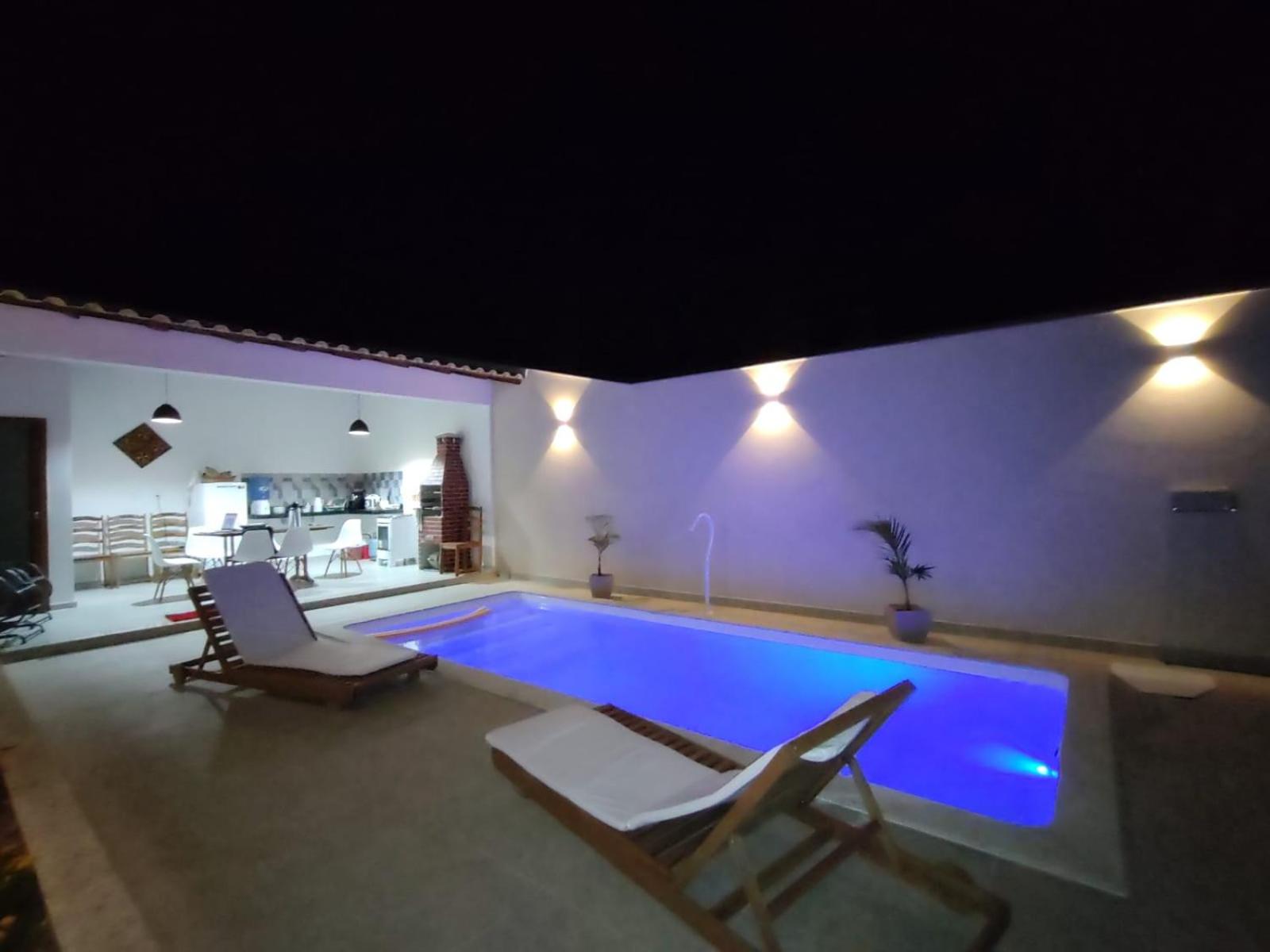 Ivana Imoveis - Casa com Piscina na Praia do Morro á 2 minutos da praia