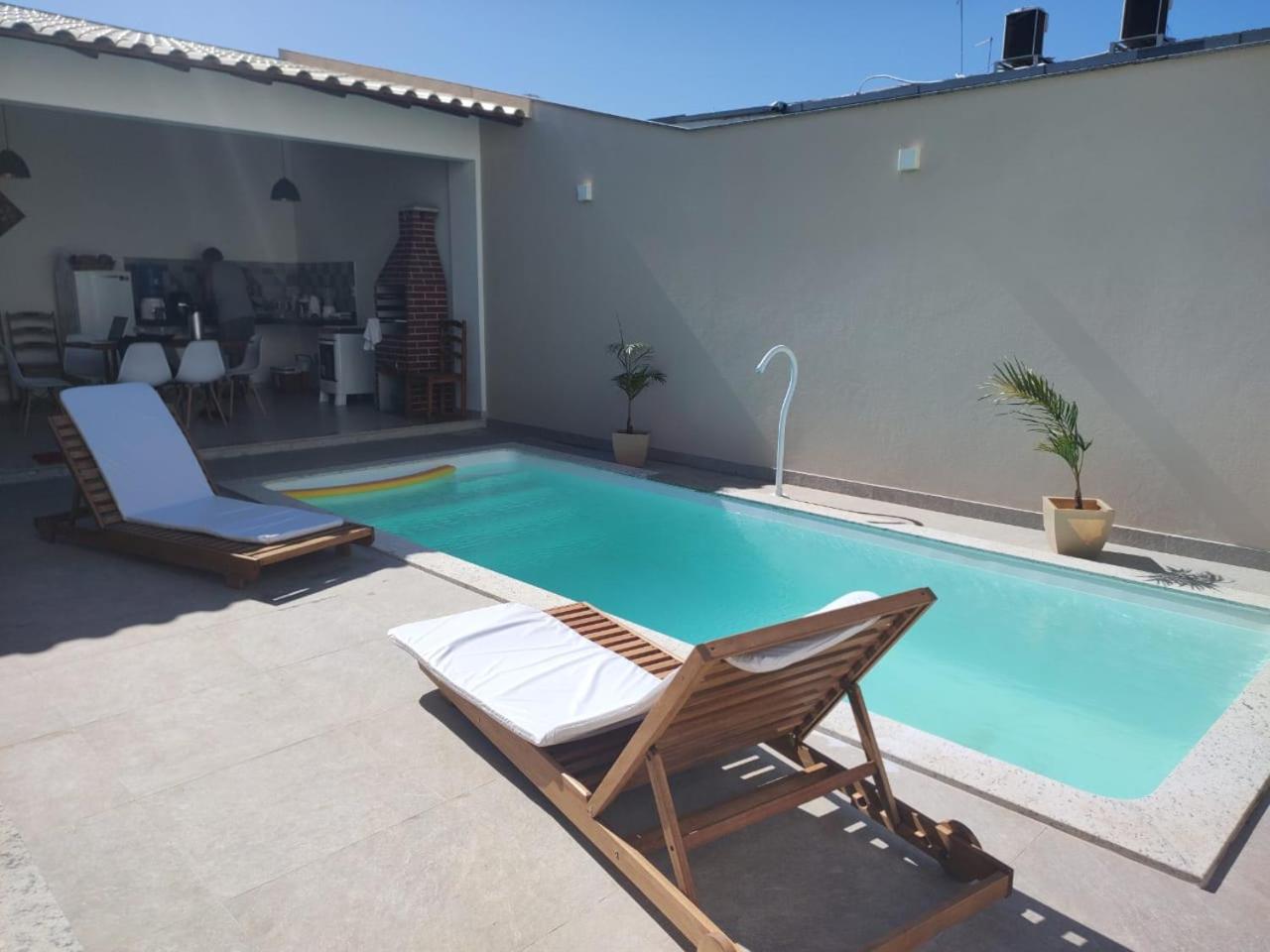 Ivana Imoveis - Casa com Piscina na Praia do Morro á 2 minutos da praia