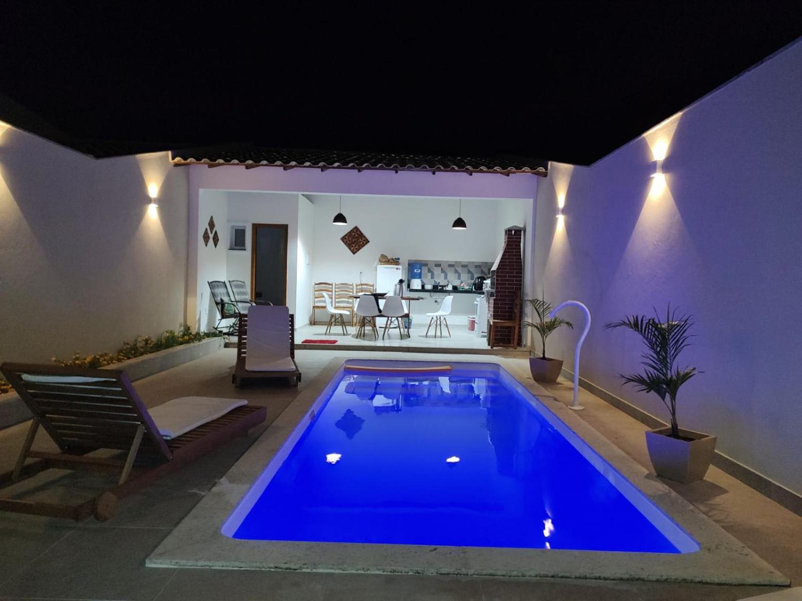 Ivana Imoveis - Casa com Piscina na Praia do Morro á 2 minutos da praia