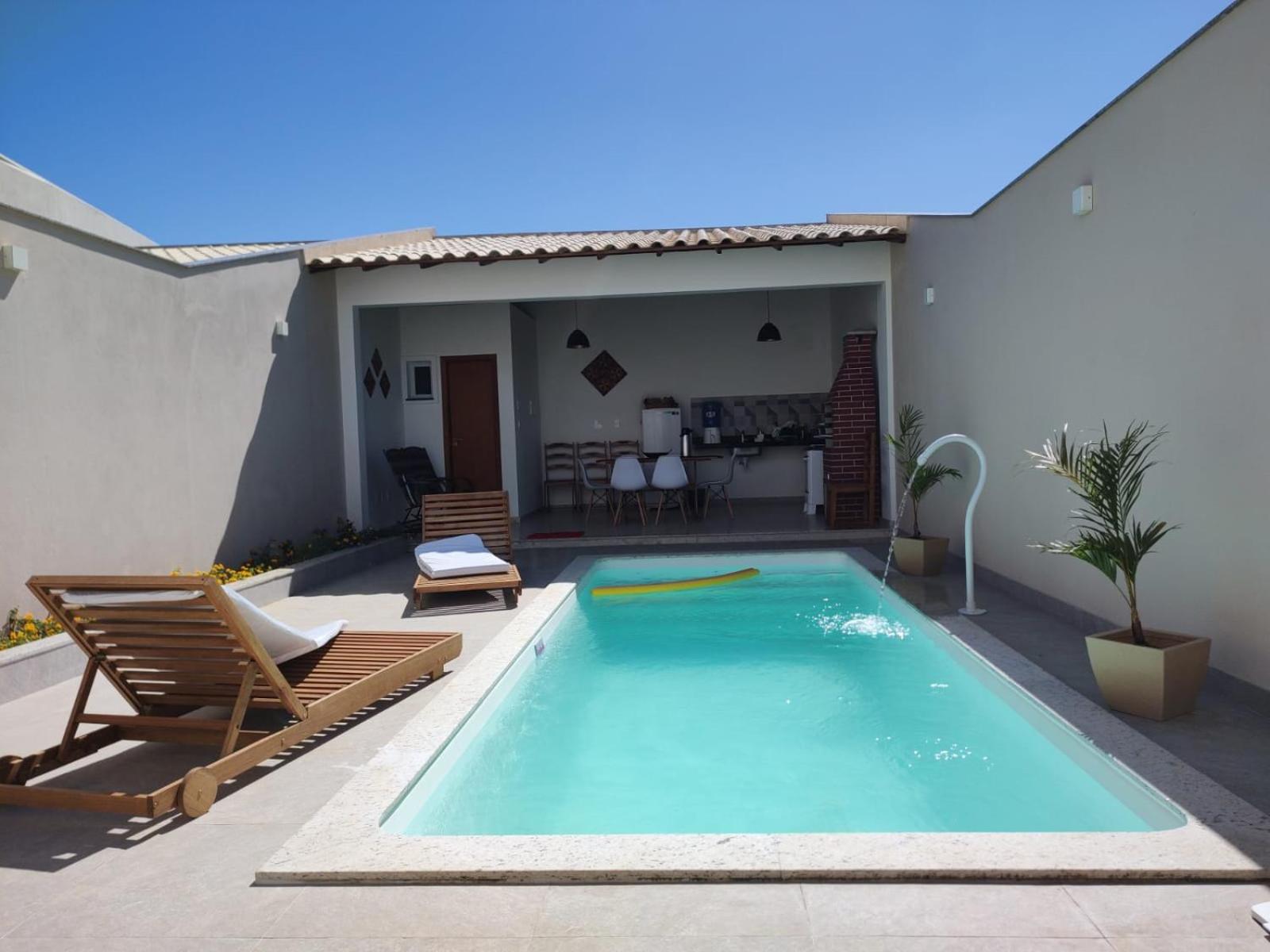 Ivana Imoveis - Casa com Piscina na Praia do Morro á 2 minutos da praia