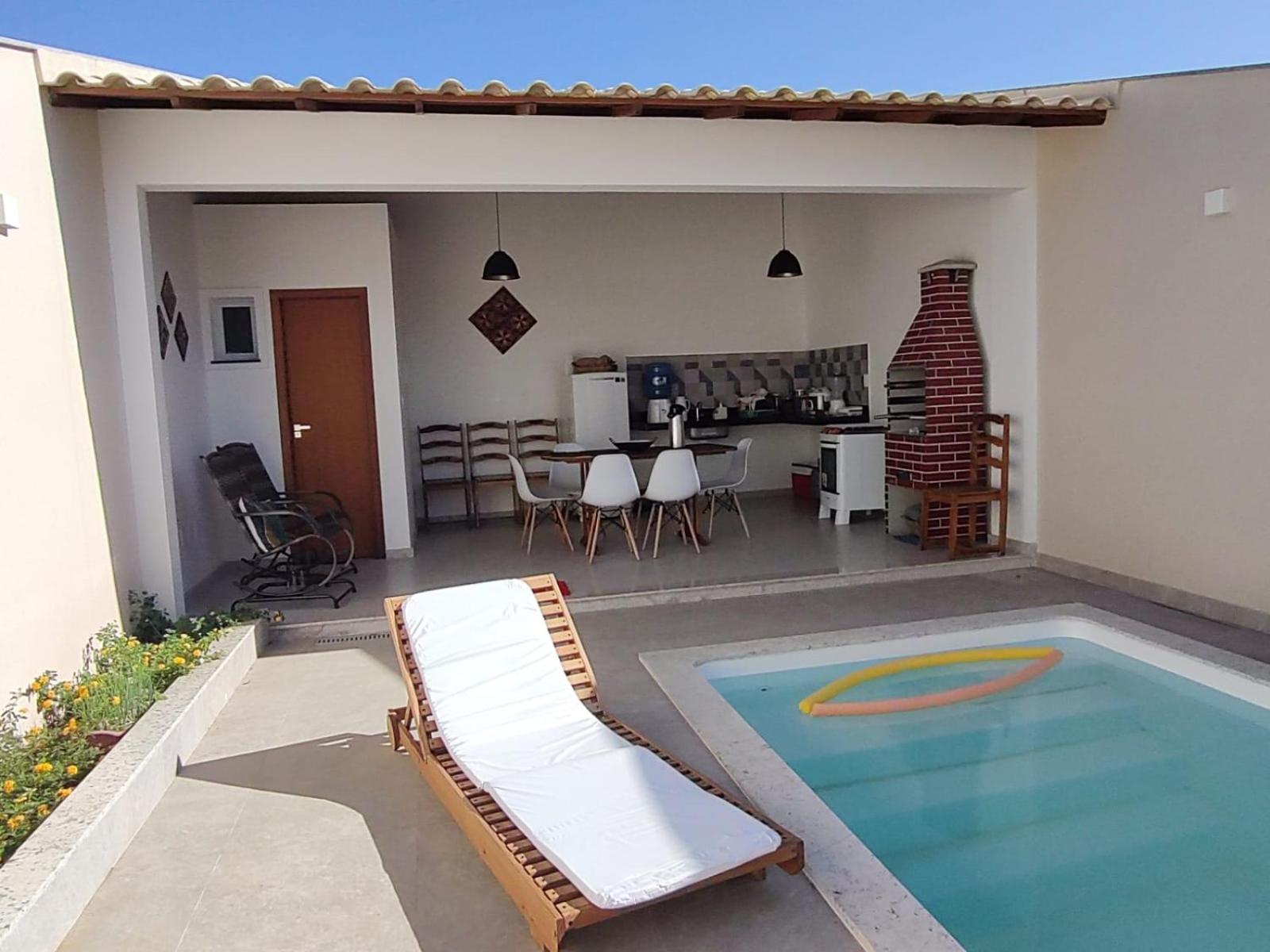 Ivana Imoveis - Casa com Piscina na Praia do Morro á 2 minutos da praia