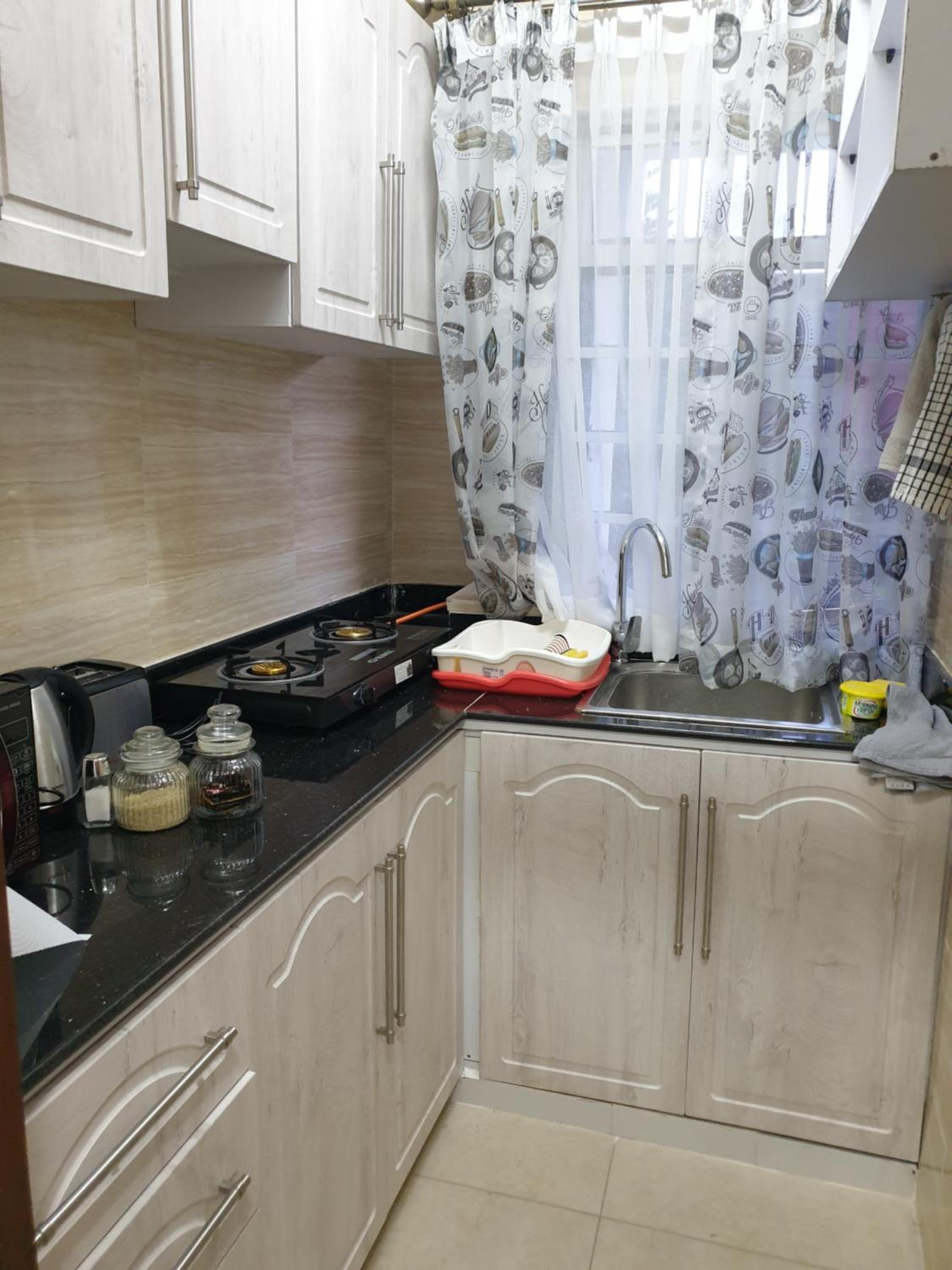 Lovely 2 and 1 bedroom guest units Karen view 5