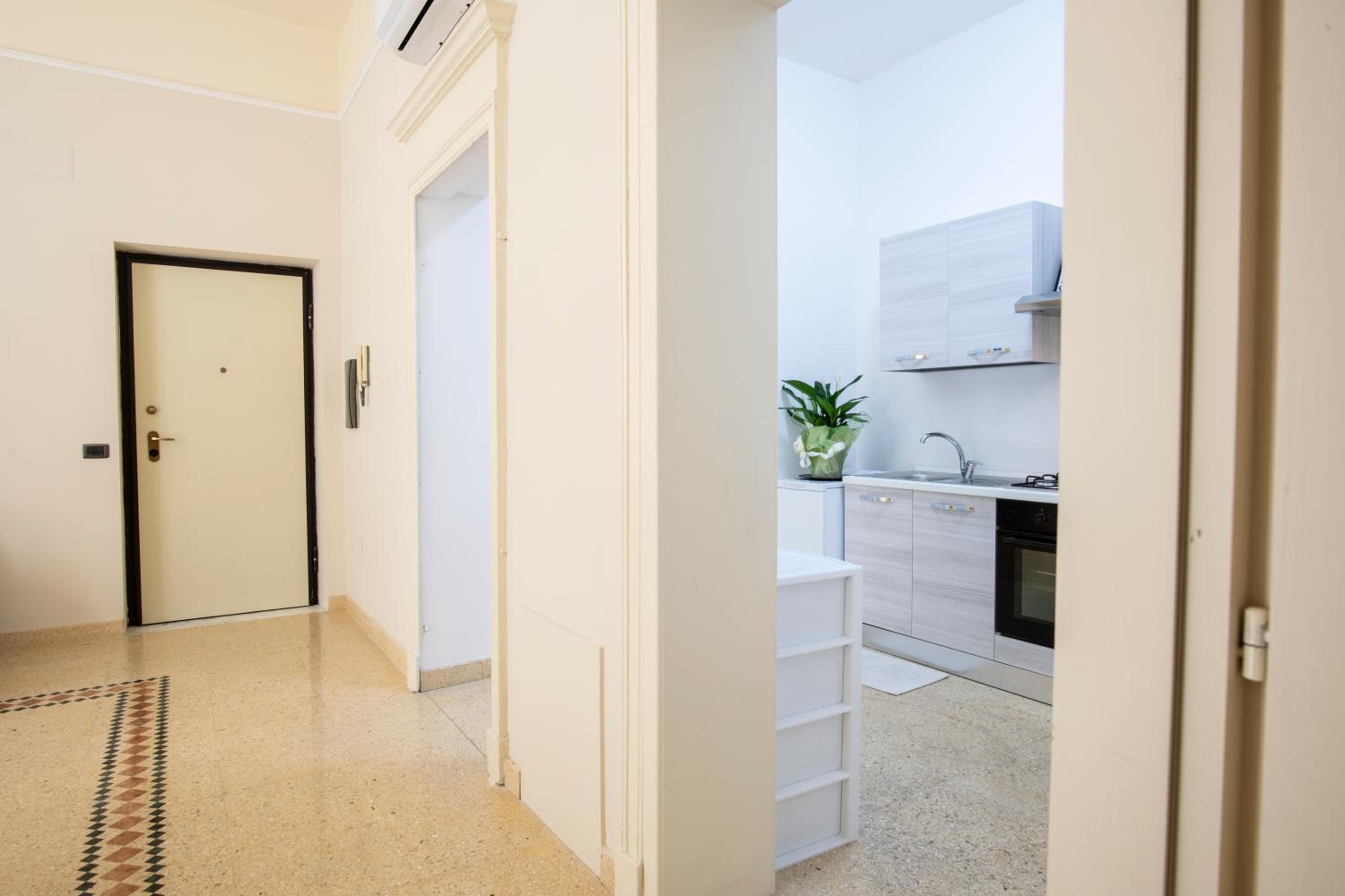 Corner Cavour Apartment en Sassari — kitchen