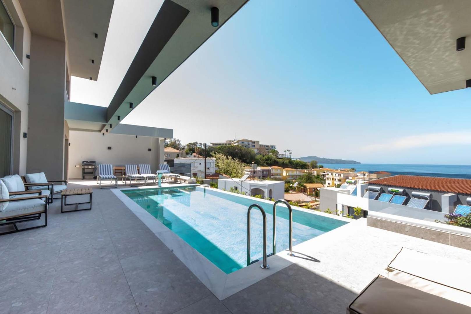 Seafront villas I "Free" Heated pools & 100m to Sea photo 5
