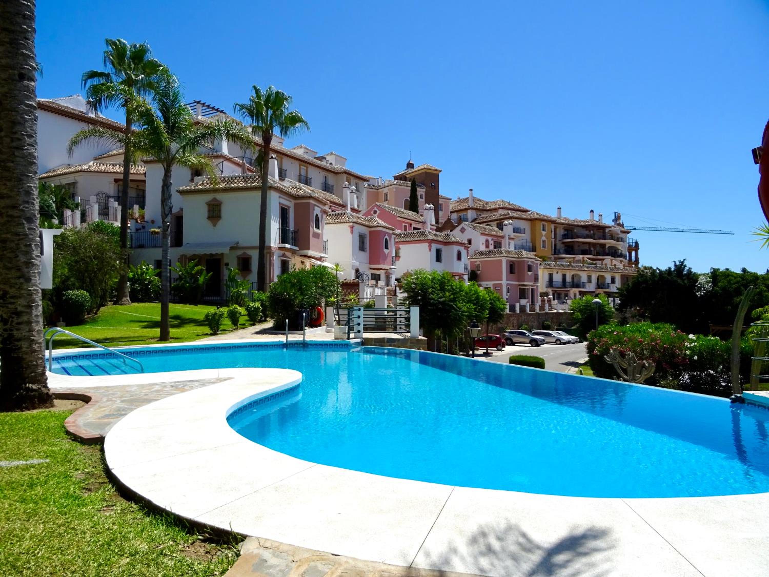Semidetached Duplex home at Puebla Aida, Mijas Golf with pool, golf and sea views