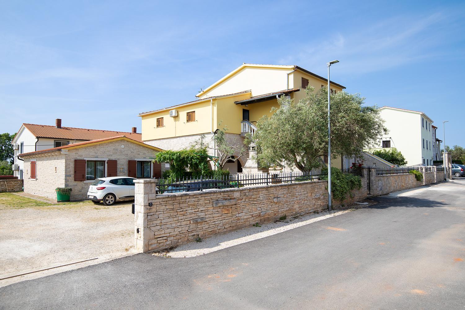 Apartments Dadic with parking & playground view 3