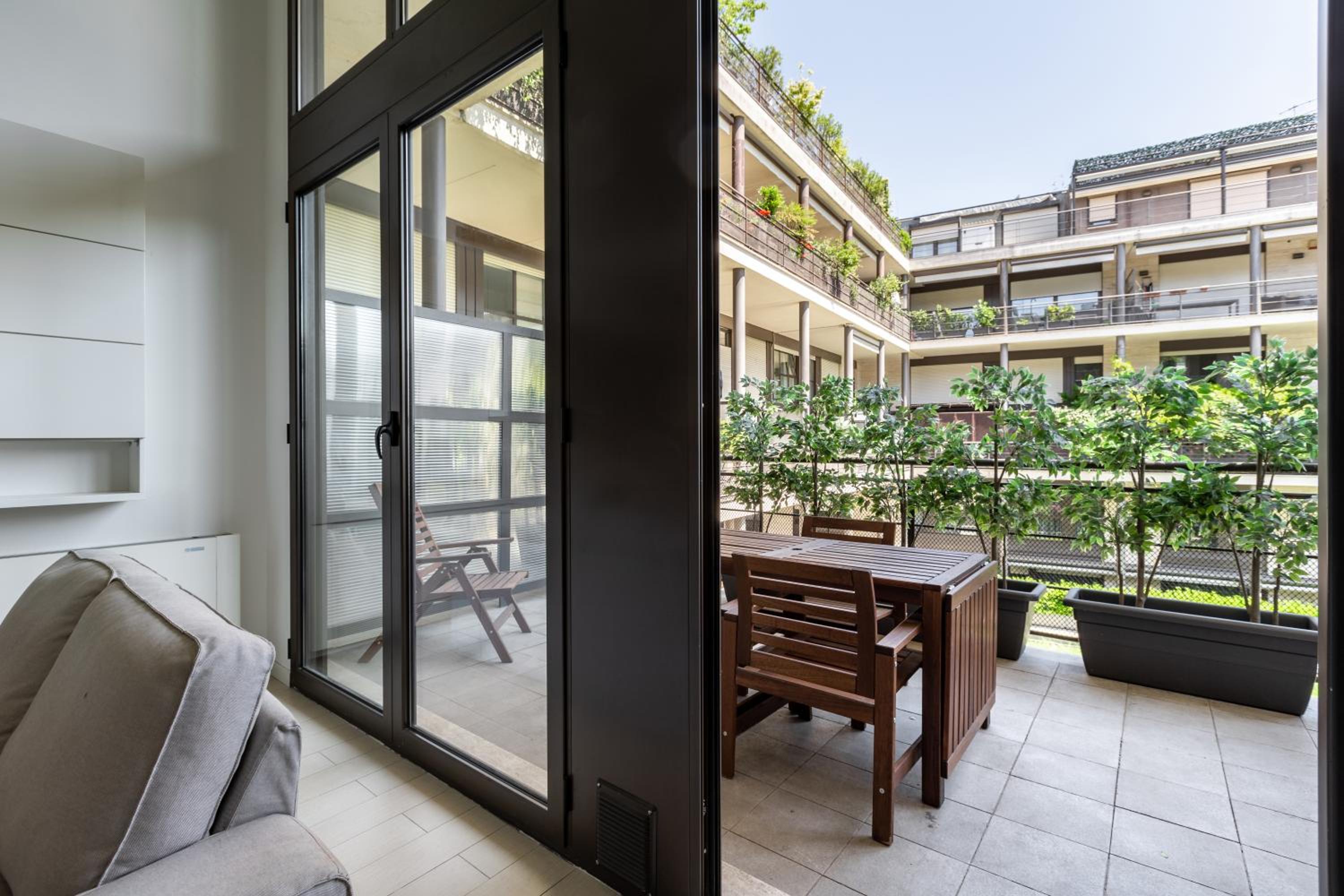 GuestHost - Elegant Loft with Balcony!