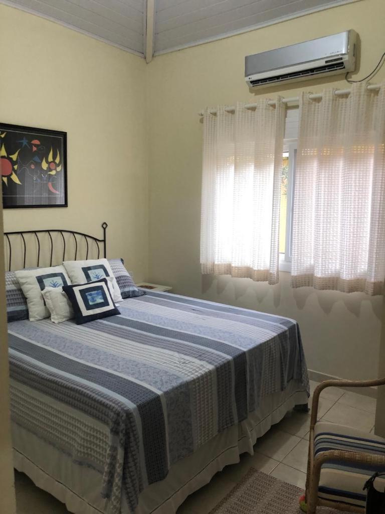Condomínio Residencial Estoril - Casa térrea - 500m da praia de Boiçucanga