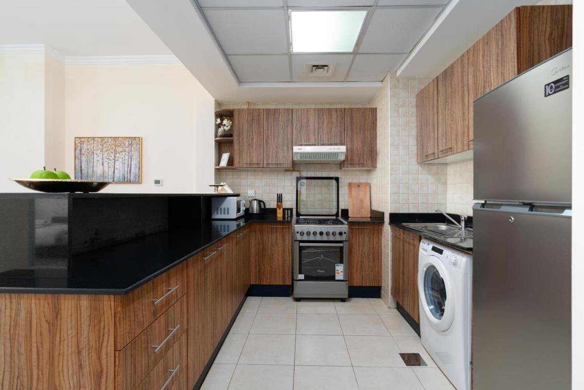 Spacious 2 beds 5 min walk from Dubai Mall with brand new gym and rooftop swimming pool