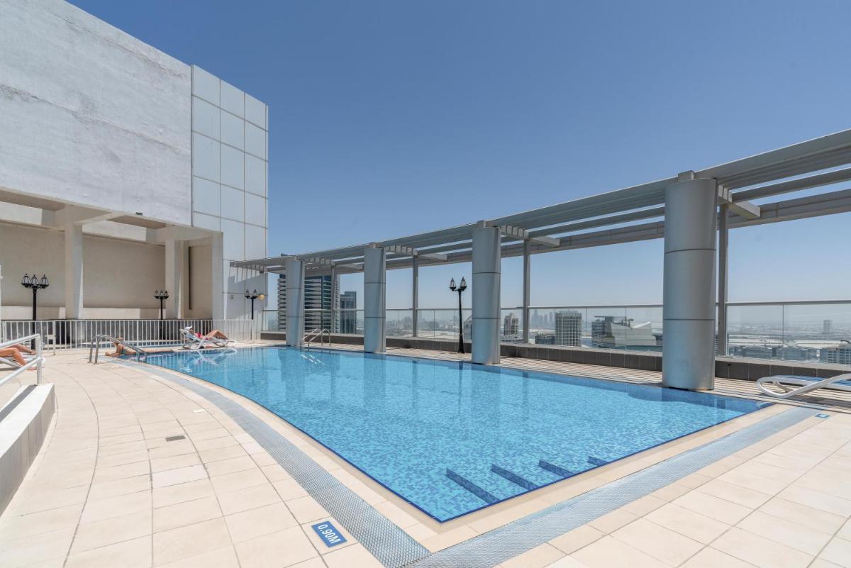 Spacious 2 beds 5 min walk from Dubai Mall with brand new gym and rooftop swimming pool