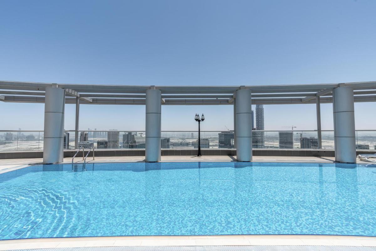 Spacious 2 beds 5 min walk from Dubai Mall with brand new gym and rooftop swimming pool