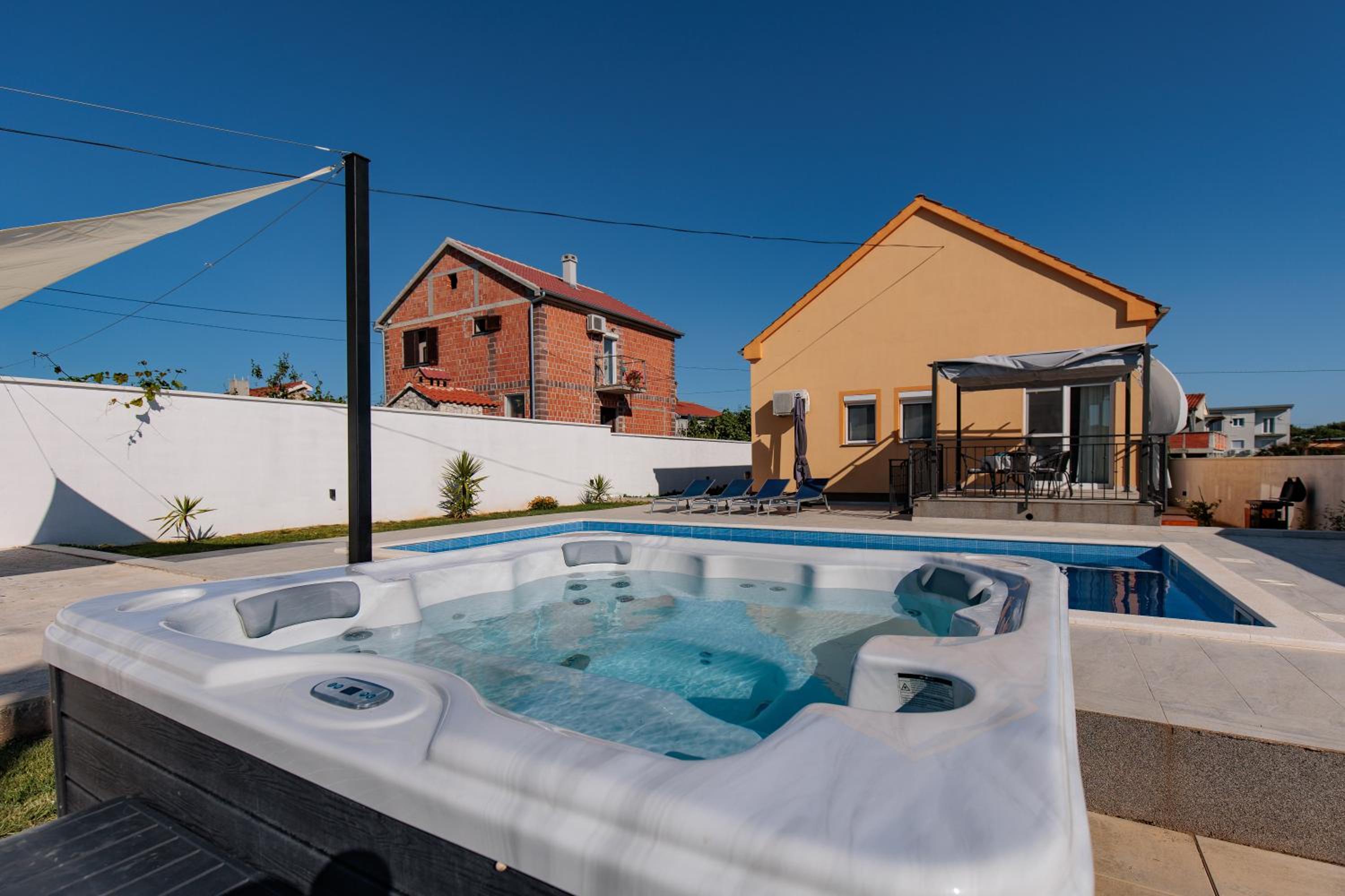 Villa Family and Friends private heated pool with jacuzzi view 4