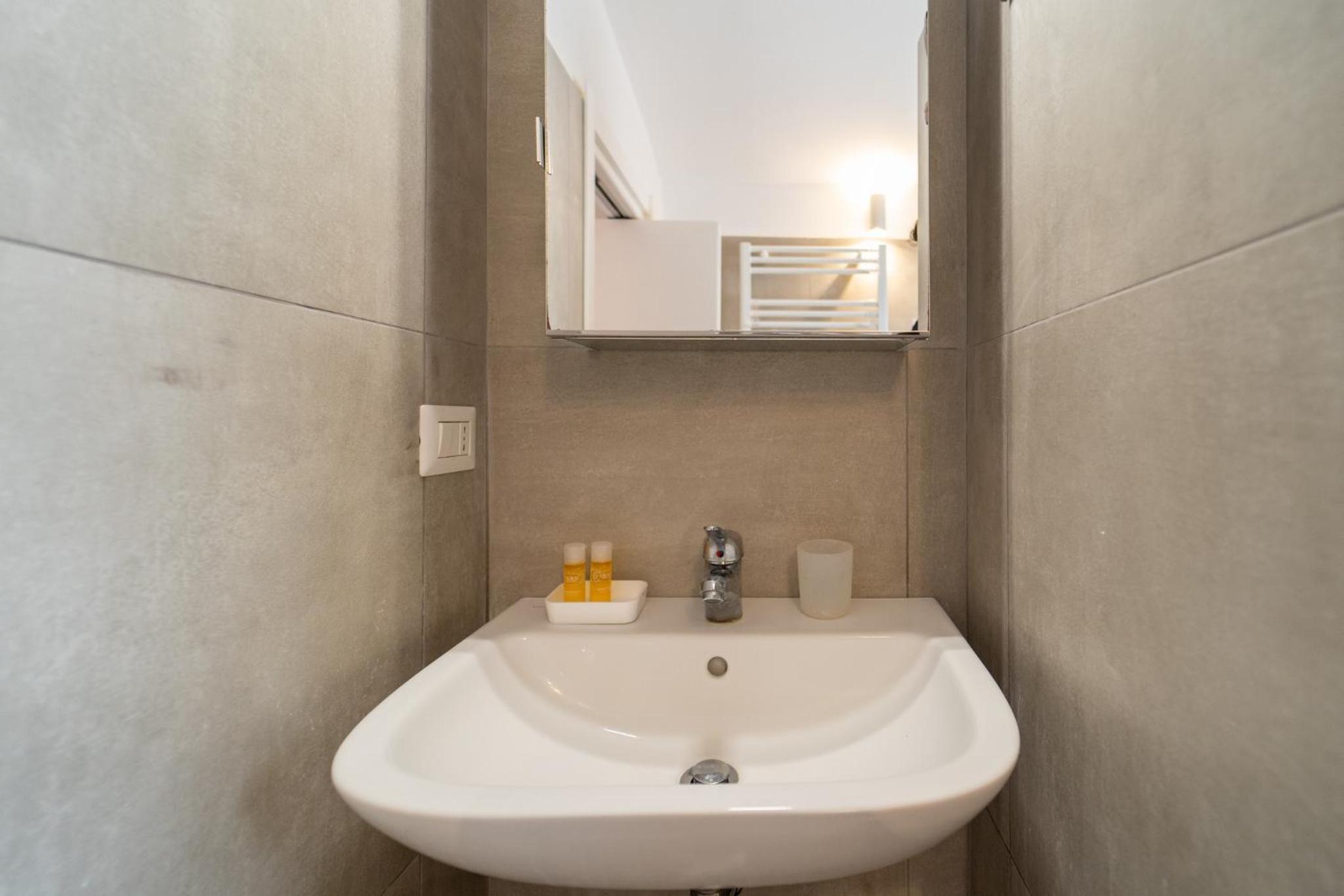 GuestHost - Ortigia Colourful Apartment photo 5