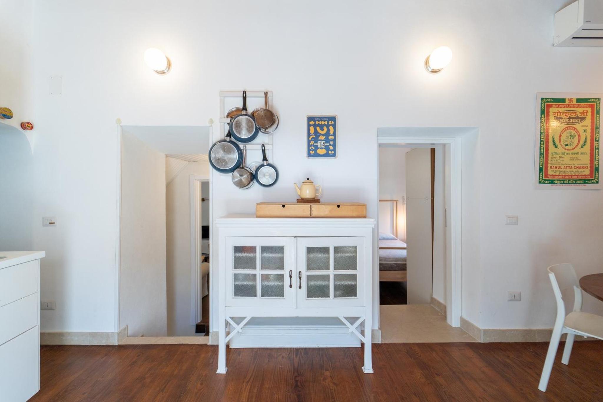 GuestHost - Ortigia Colourful Apartment photo 4