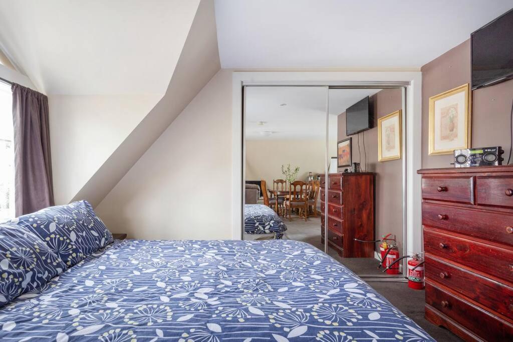 Upstairs Studio Apartment with street access view 3