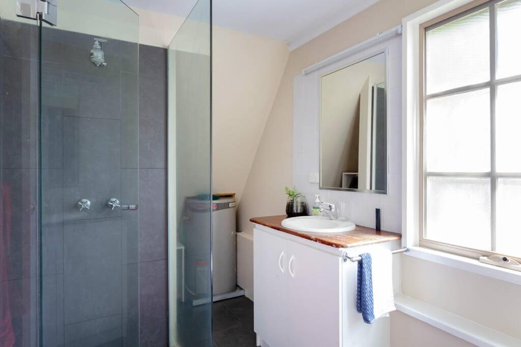 Upstairs Studio Apartment with street access view 4