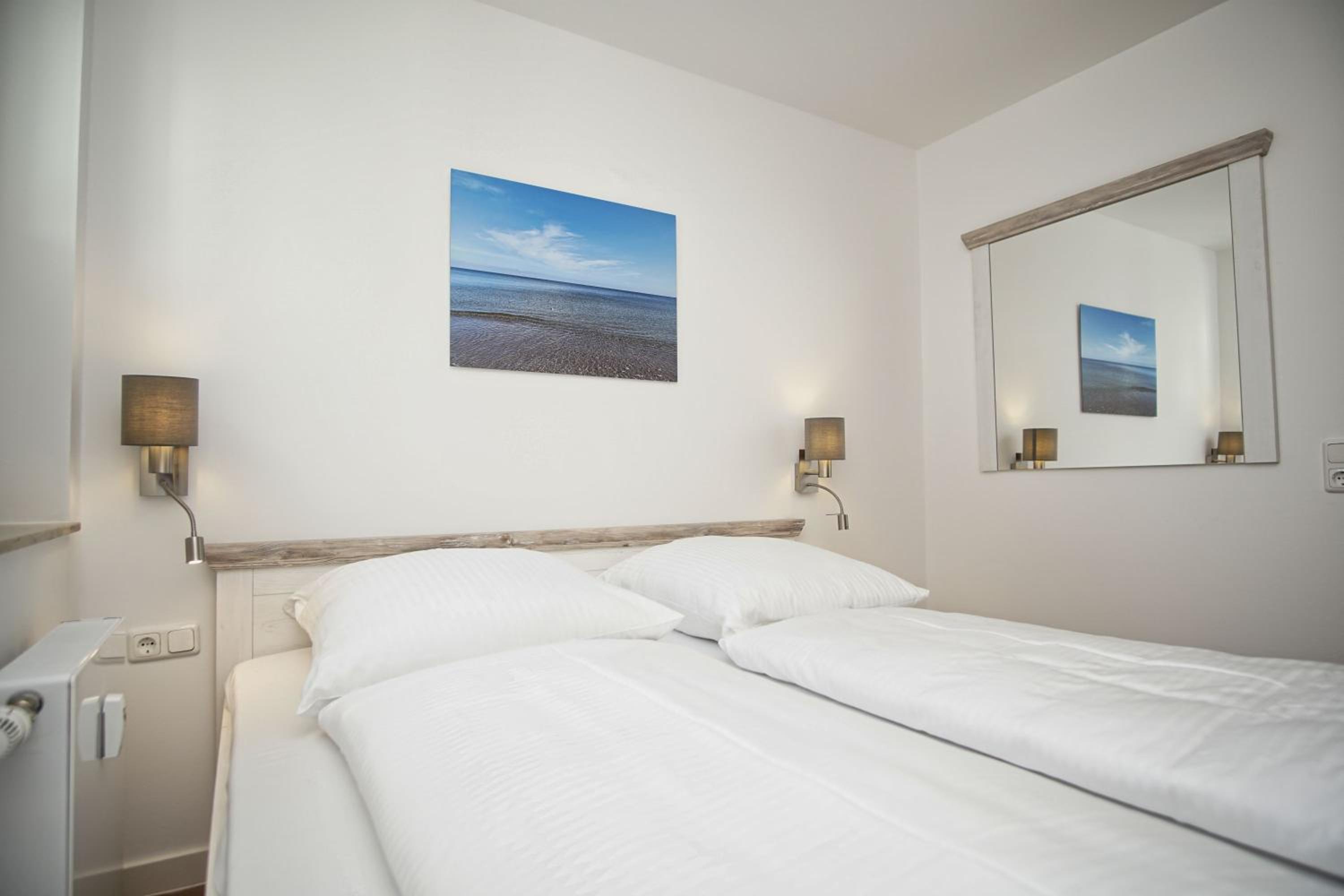 Terrasse, gratis Nutzung vom AHOI Erlebnisbad und Sauna in Sellin - Villa Karola FeWo 02