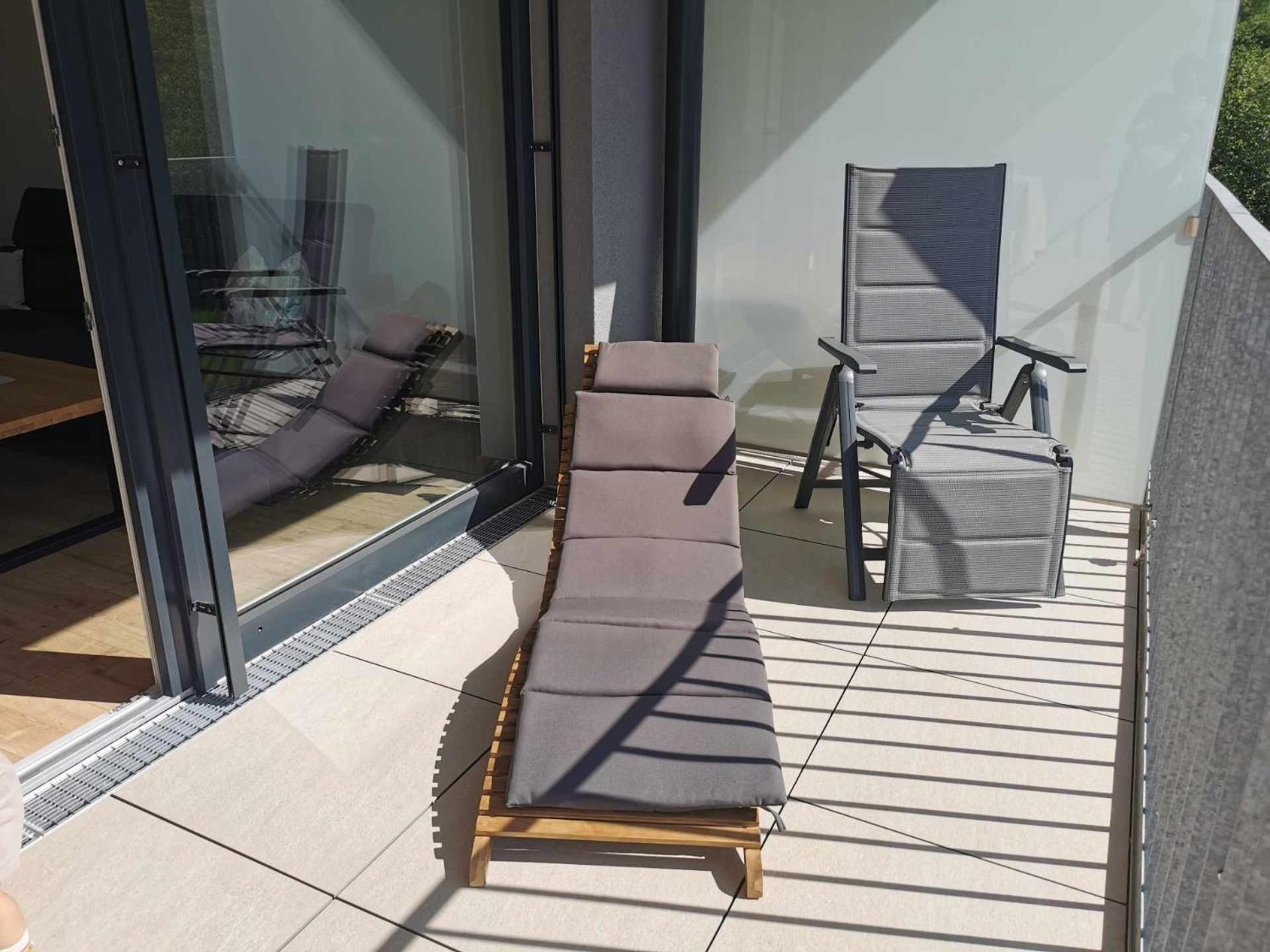 Ferienwohnung Bergsonne mit Sonnenbalkon und Tiefgaragen Parkplatz