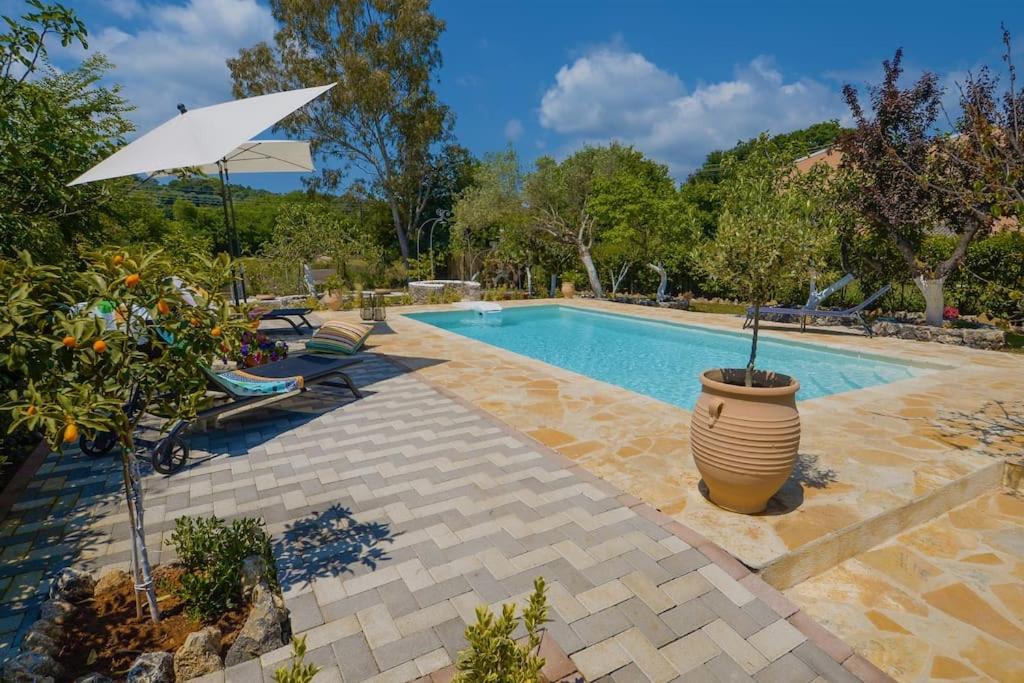 The Red House in Dassia photo 2