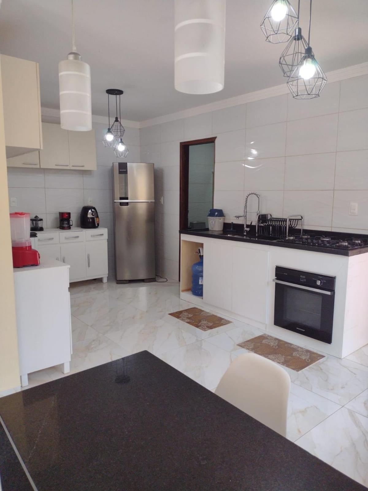 Praia Enseada dos Corais - casa com piscina -Pos Beira mar - 4 Quartos