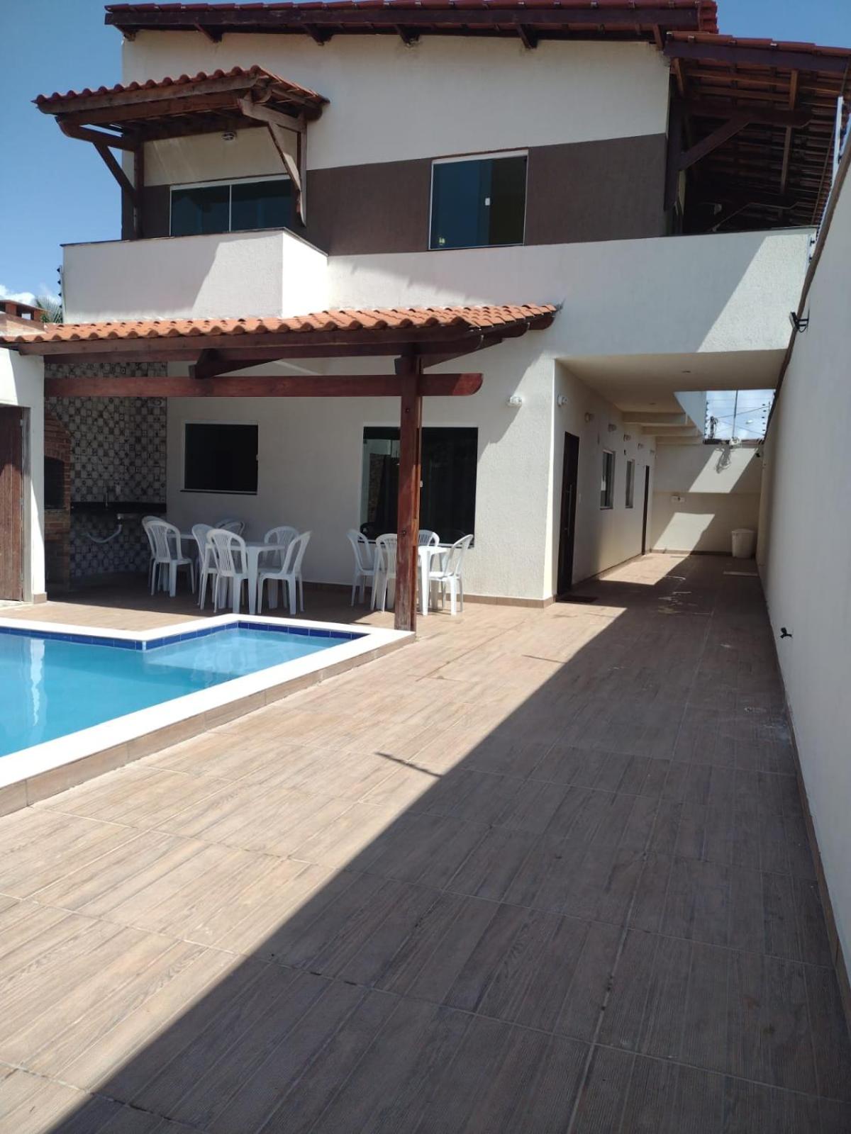 Praia Enseada dos Corais - casa com piscina -Pos Beira mar - 4 Quartos