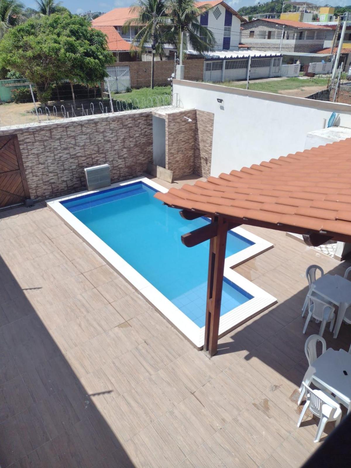 Praia Enseada dos Corais - casa com piscina -Pos Beira mar - 4 Quartos
