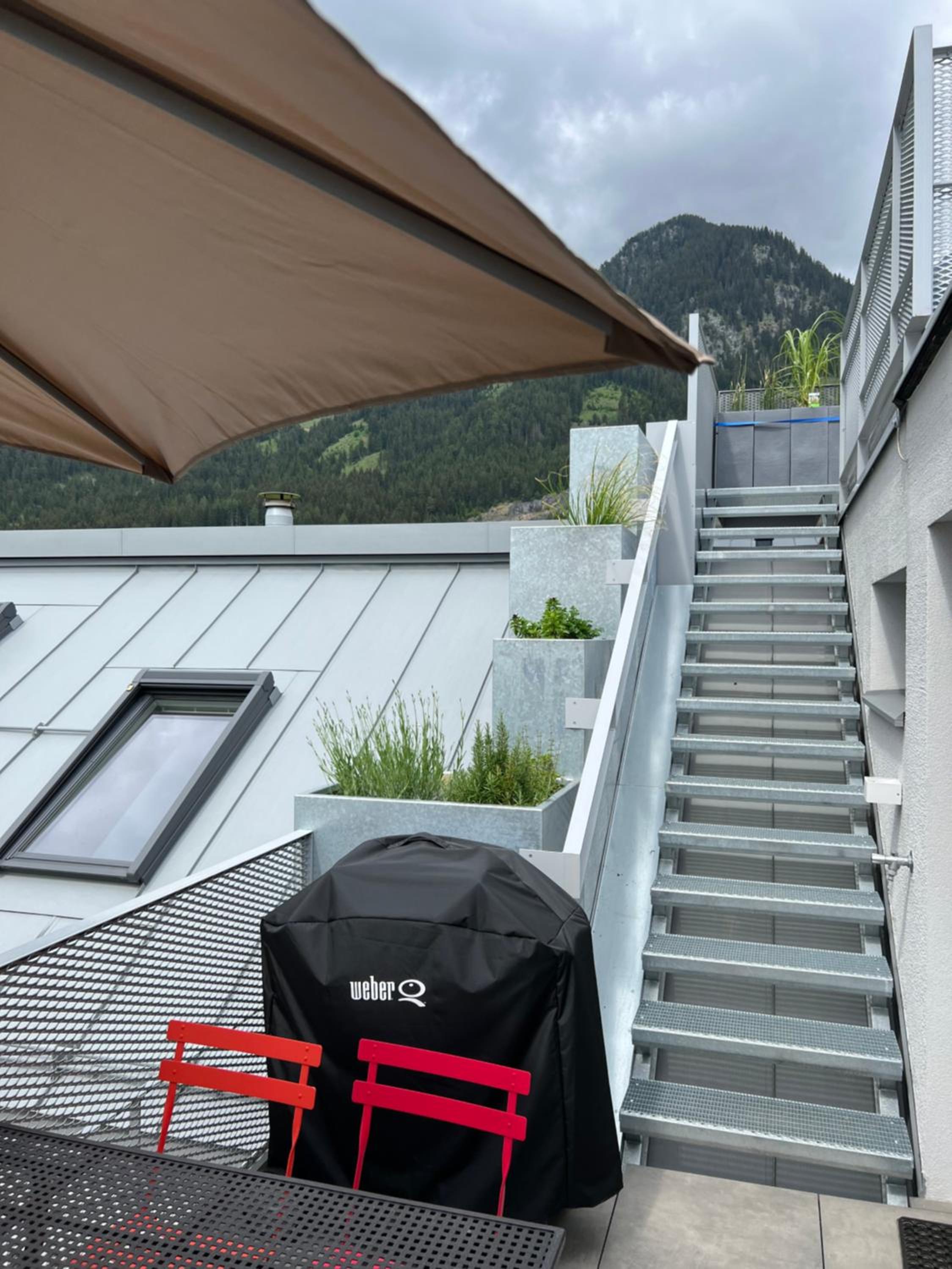 Modern Alpine Penthouse with Lake View
