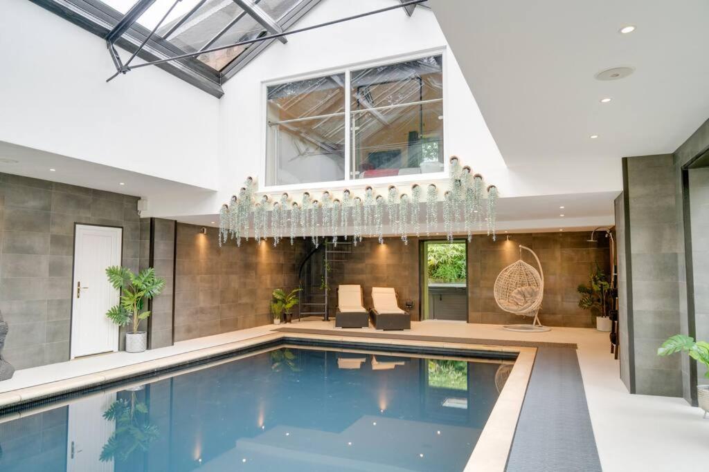 Sleeps 18. Stunning gardens, pool and hot tub. view 2