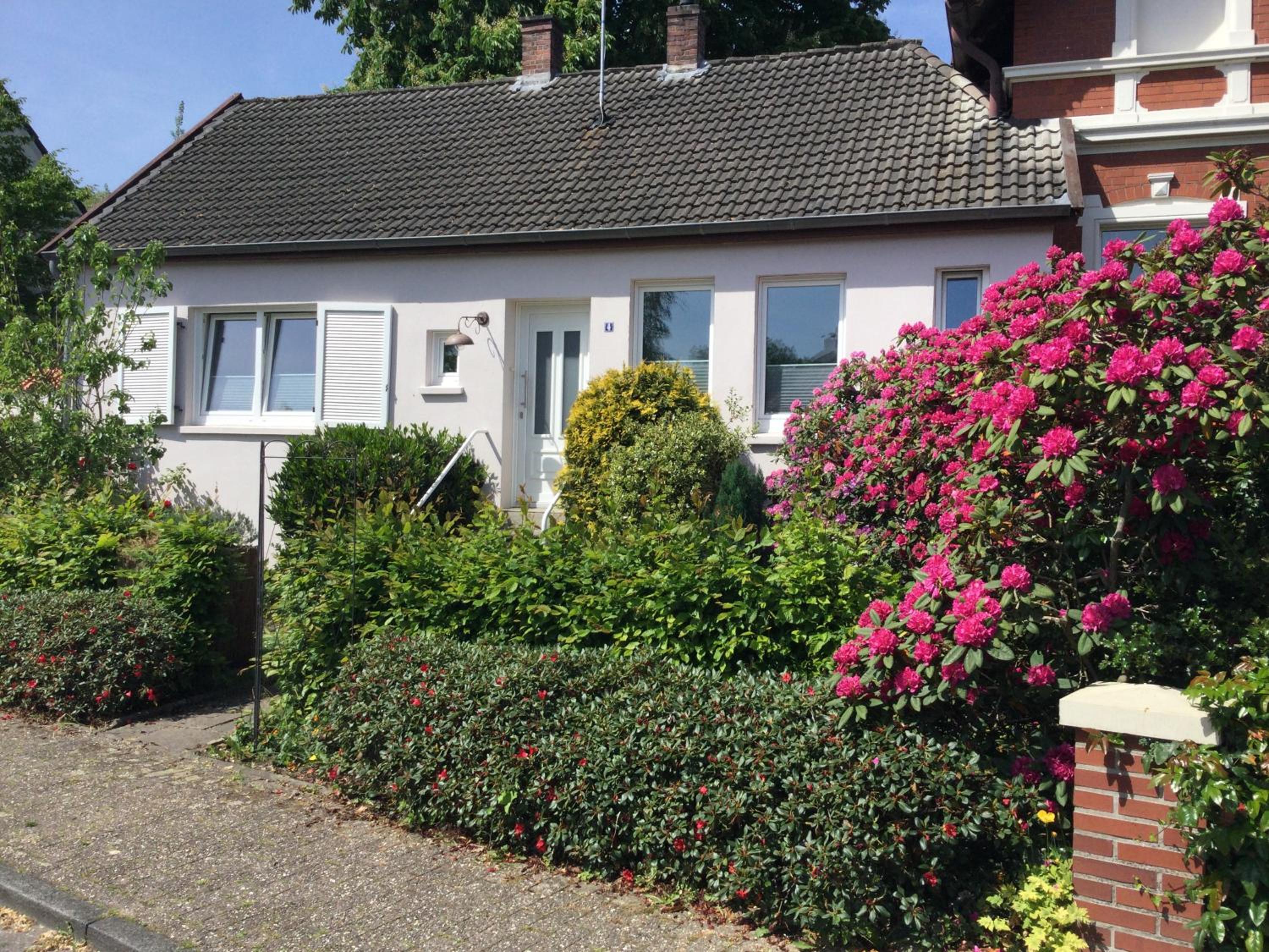 Ferienhaus Us lütt Hus und das Zimmer Linde im Haupthaus