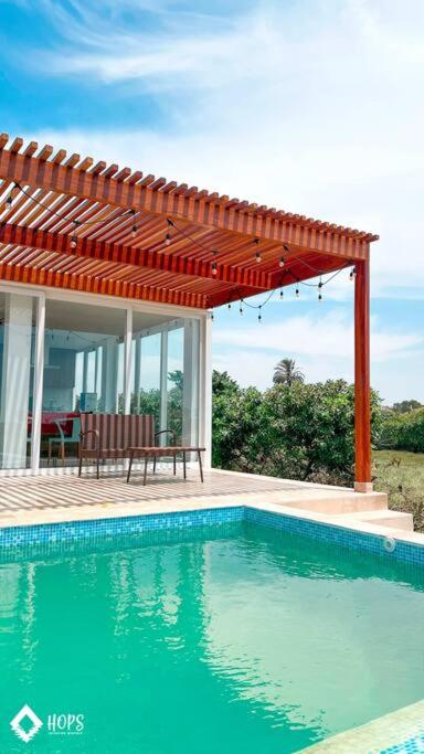 HOP BUZIOS exclusiva oasis y playa en Chincha