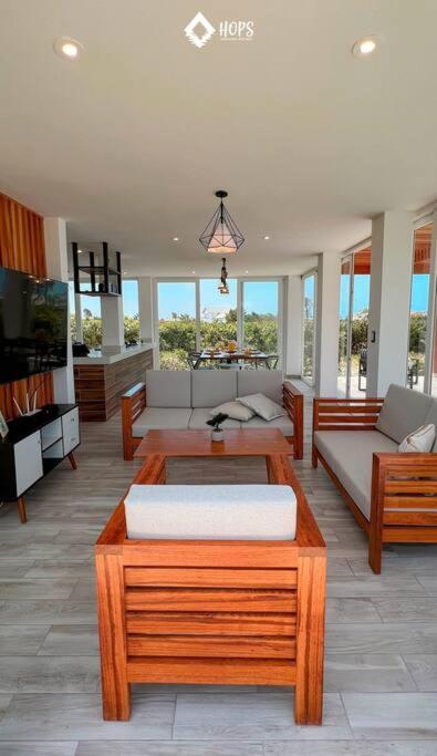 HOP BUZIOS exclusiva oasis y playa en Chincha