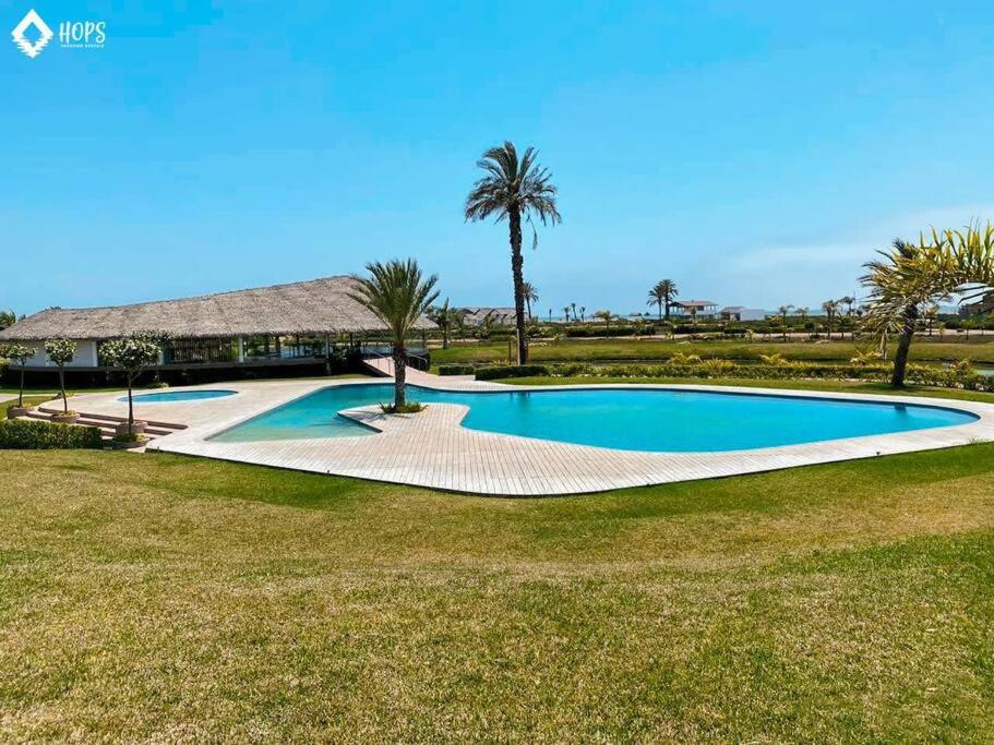 HOP BUZIOS exclusiva oasis y playa en Chincha