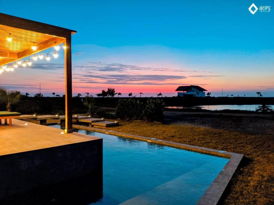 HOP BUZIOS exclusiva oasis y playa en Chincha