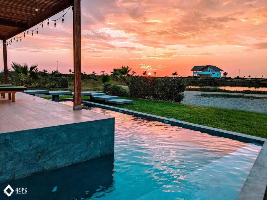 HOP BUZIOS exclusiva oasis y playa en Chincha