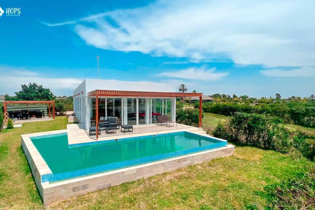 HOP BUZIOS exclusiva oasis y playa en Chincha