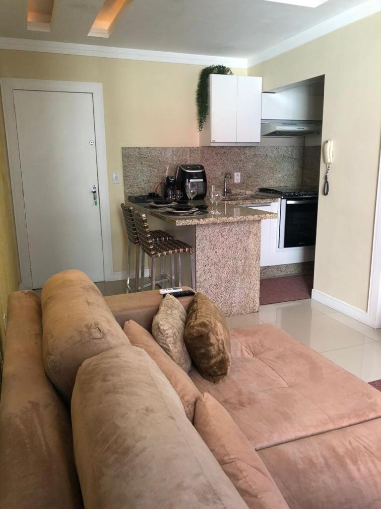 PÉ NA AREIA - Suíte à beira-mar com garagem