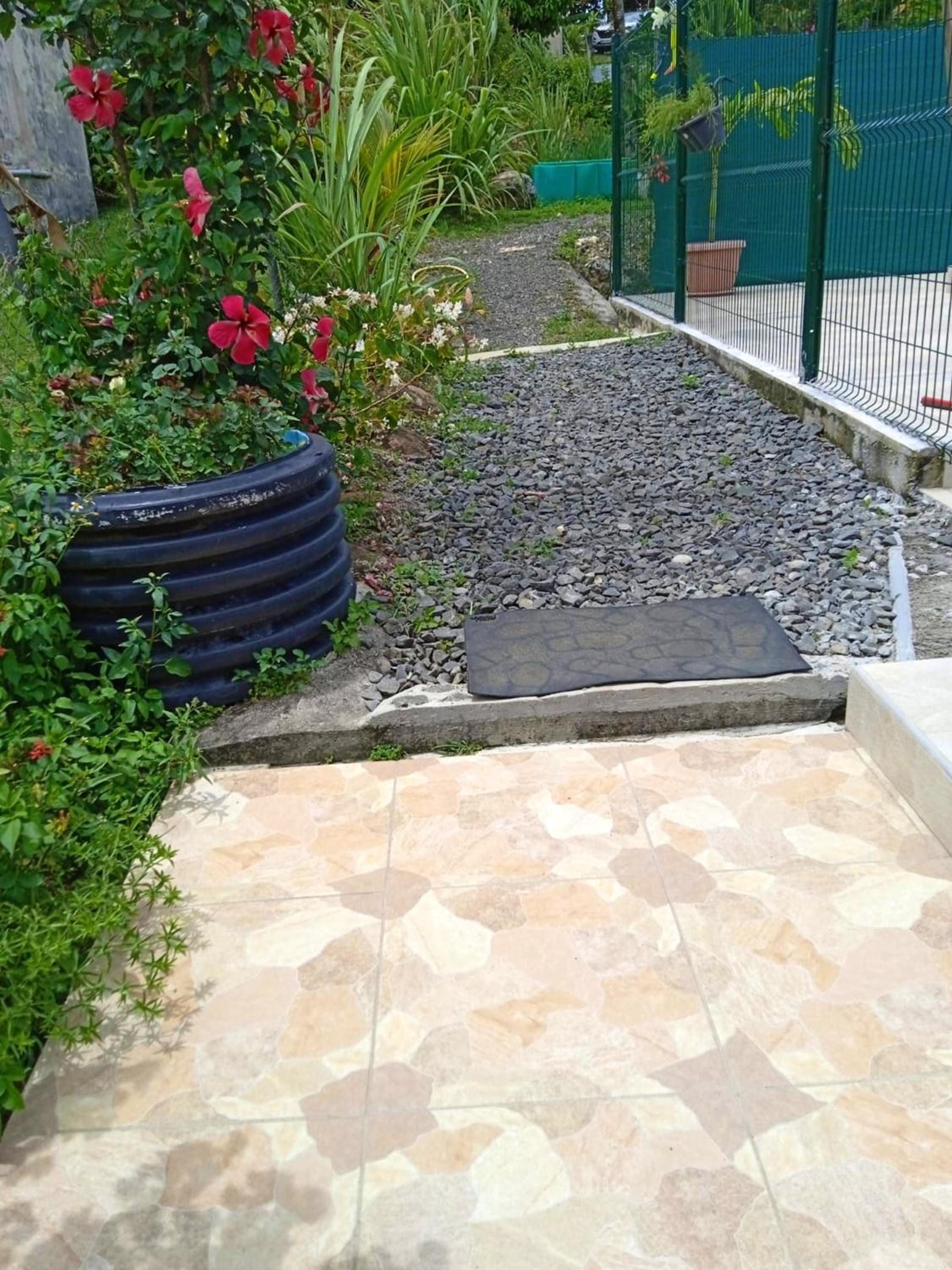 Maison de charme à Petit Bourg avec piscine partagée