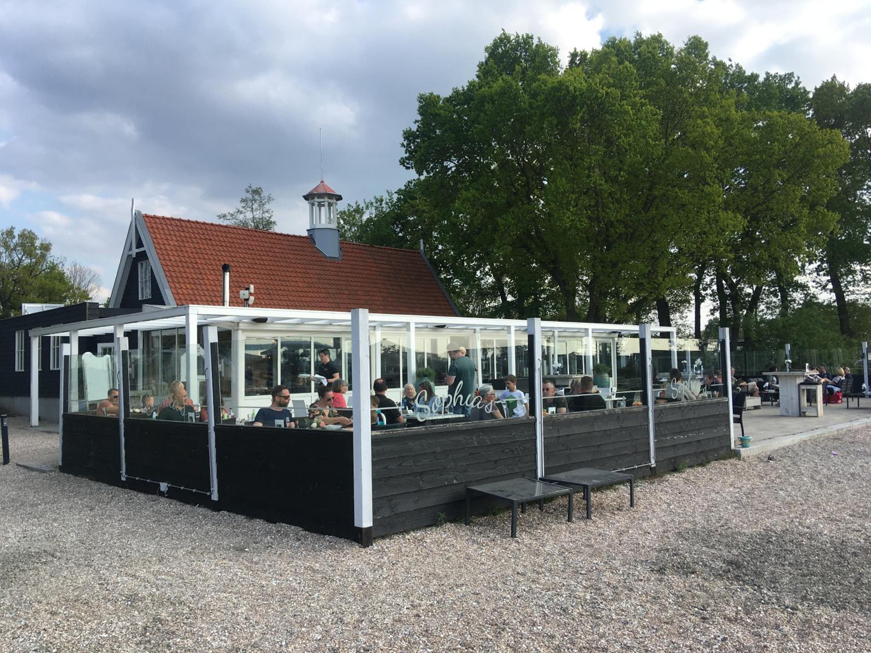 Fraai Tiny House aan het veluwemeer met uitzicht & veranda view 5