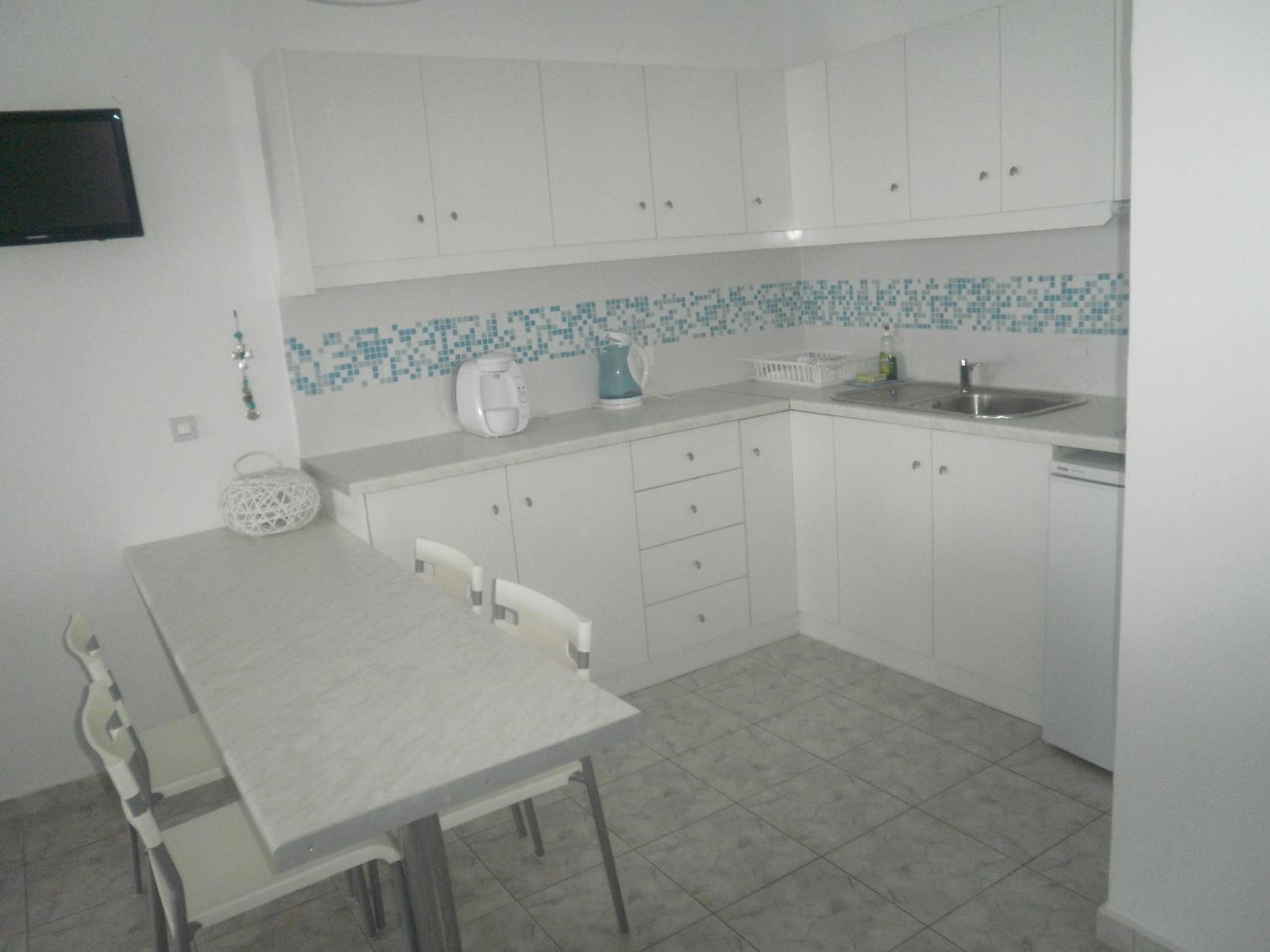 Blue and White Studios & Apartments