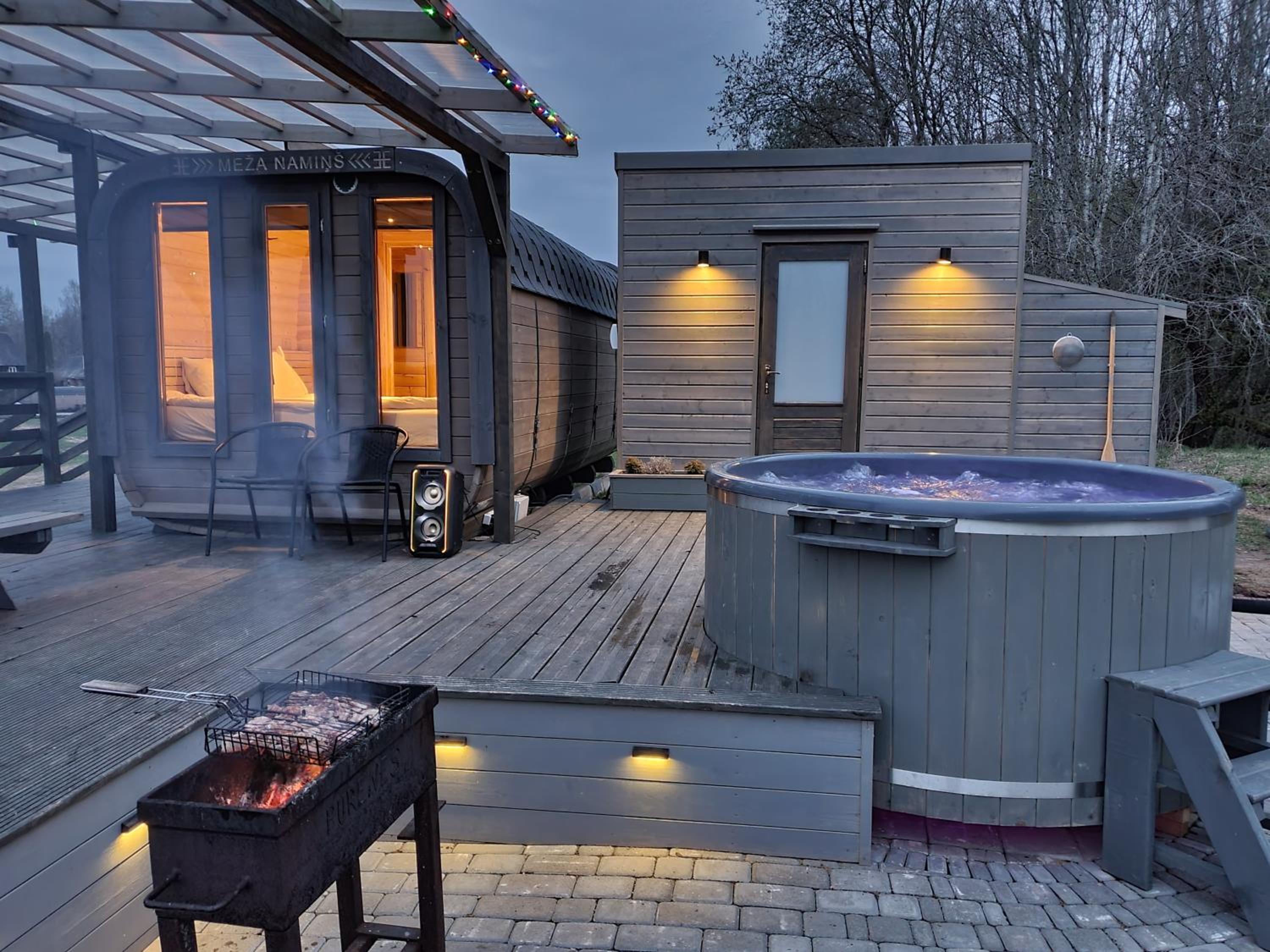 Purenes - Barrel shaped pod with hot tube view 2