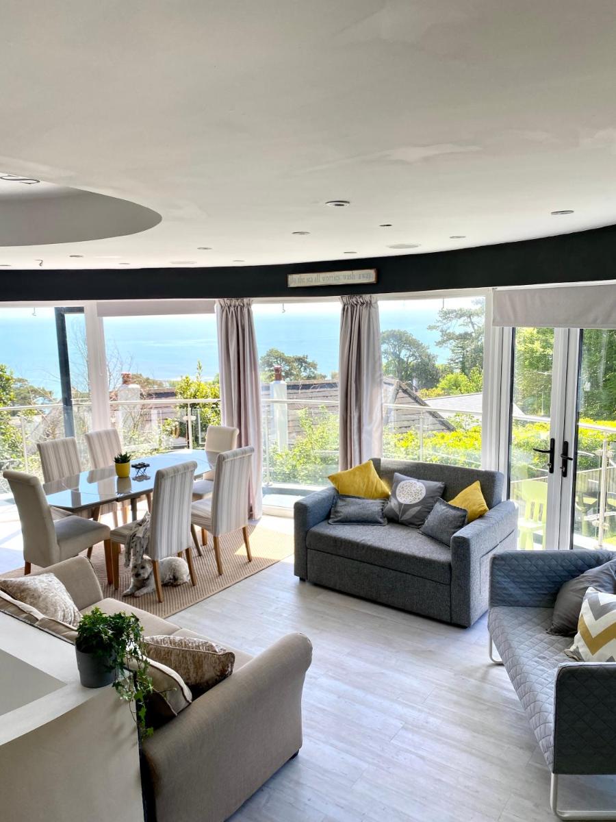 One of the best properties in Lyme! Breathtaking views across the whole bay. 3 stories with 2 tier veranda around the property. Sleeps 6 view 4