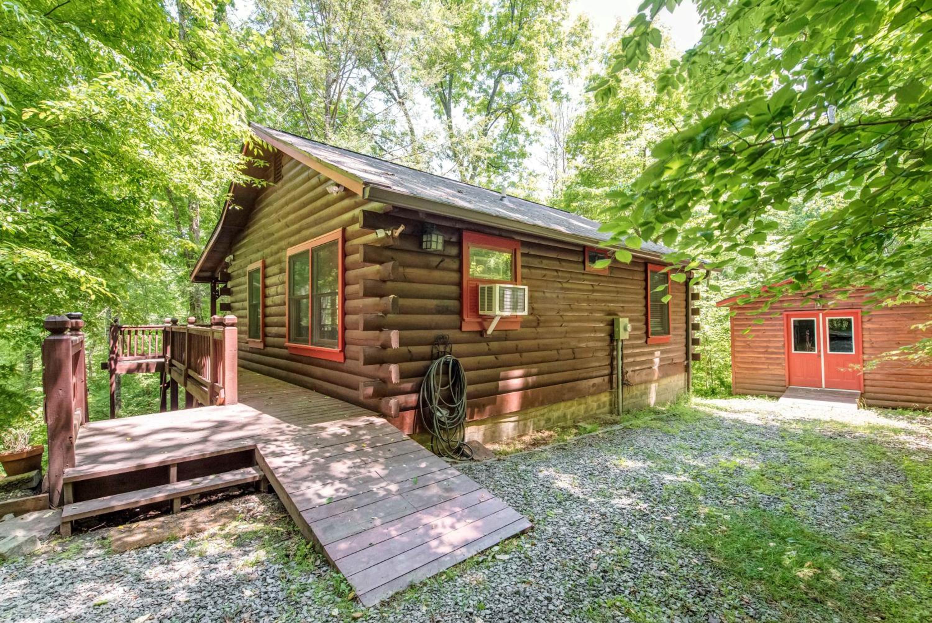 Loony Bear Cabin is Pet Friendly with Wood Stove Creekside Firepit view 2