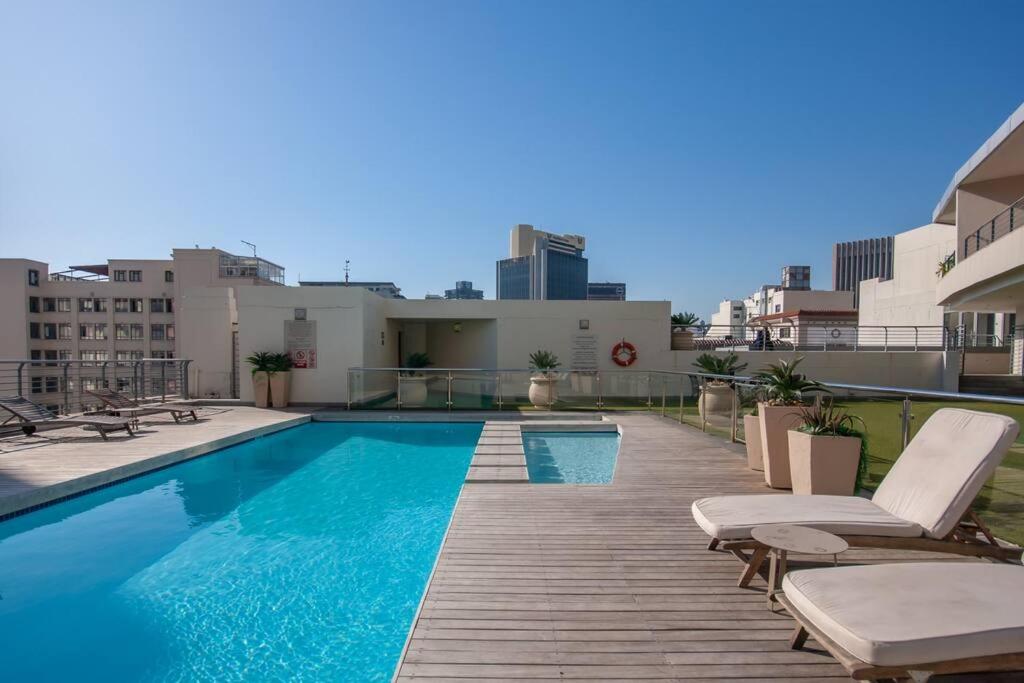 City Life Apartment with Rooftop Pool!