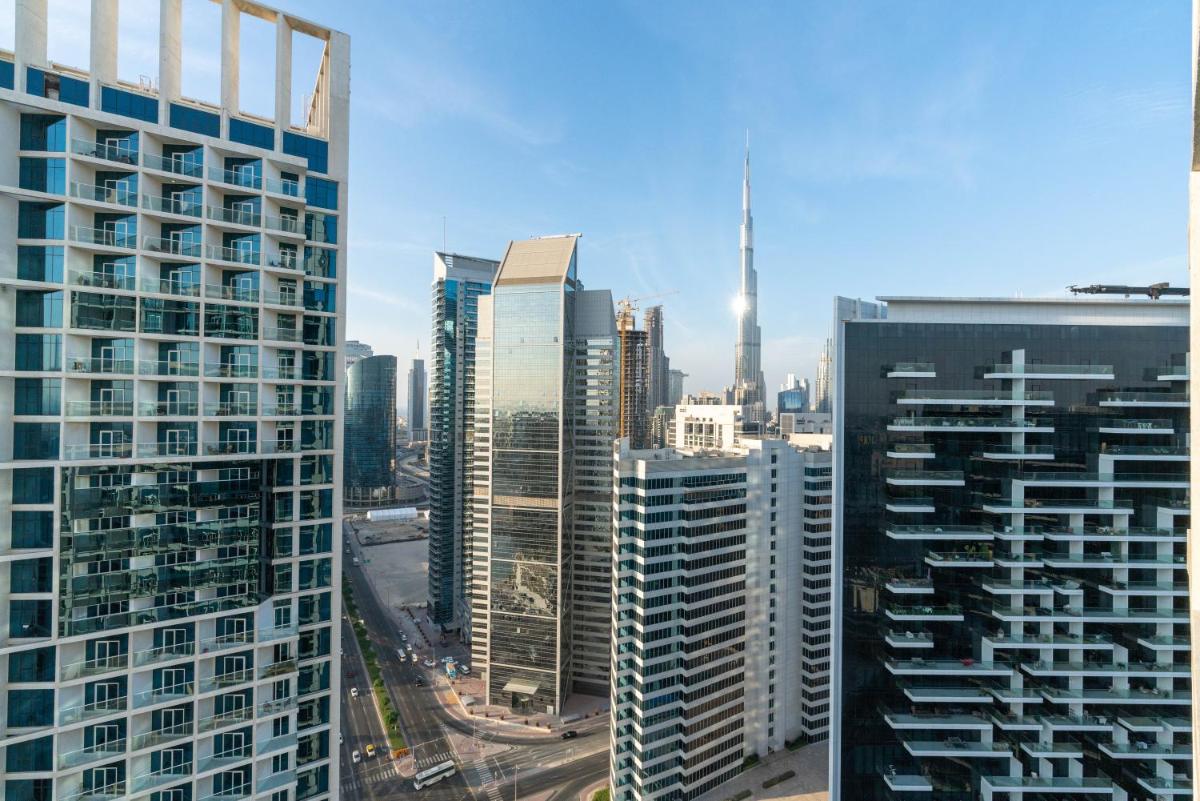 Vacay Lettings - Burj Khalifa & Canal view Studio at Damac Prive