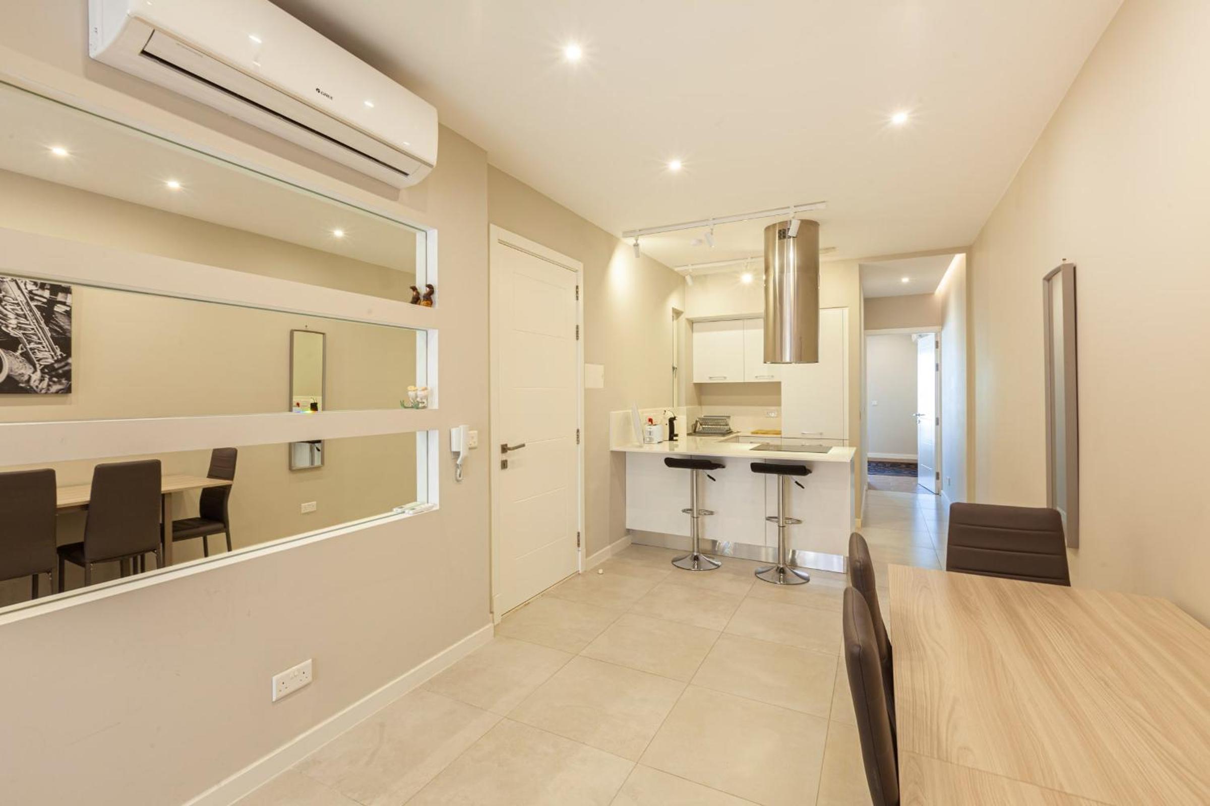Brand new 1BR in central MALTA view 2