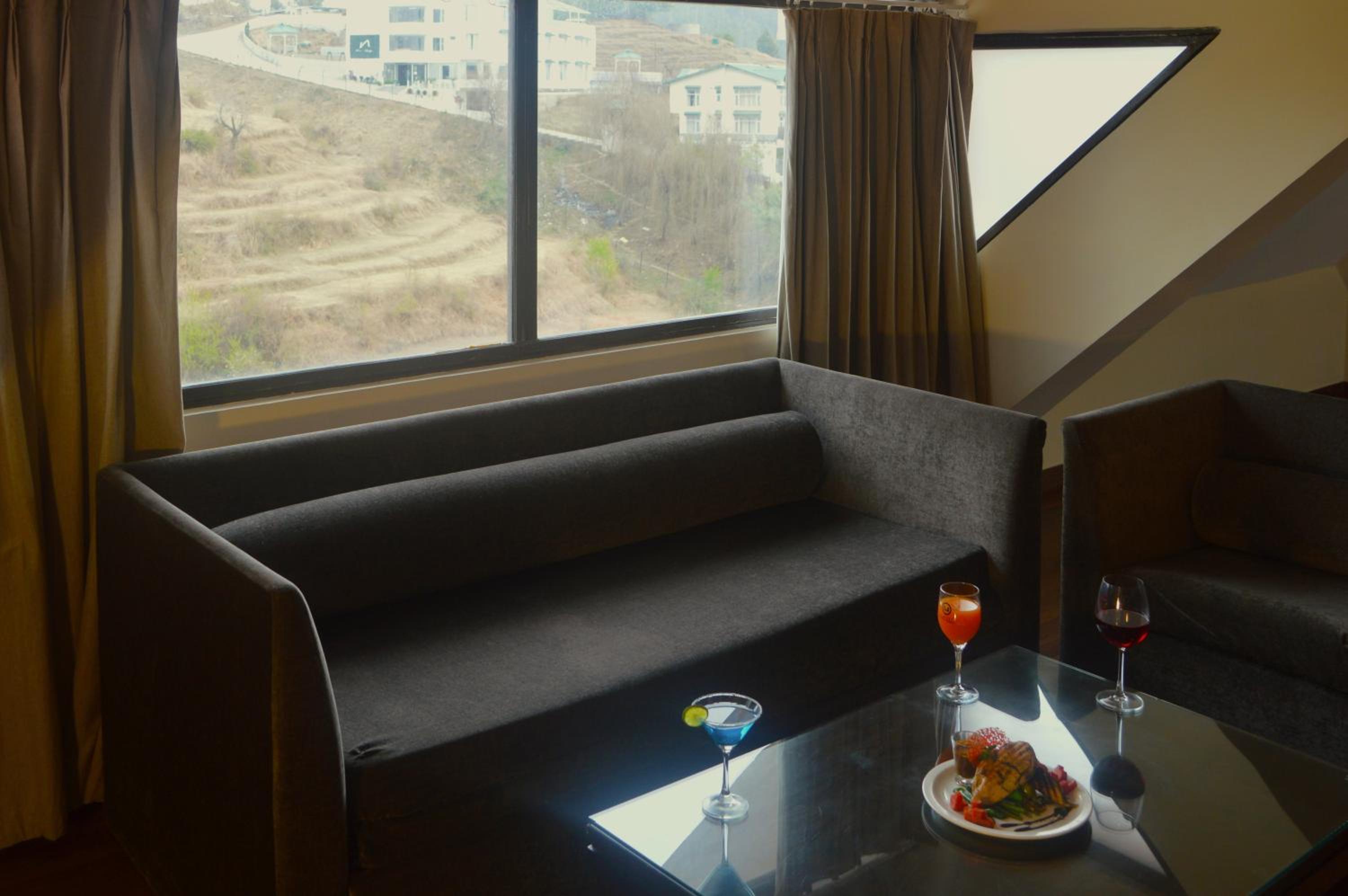 Marigold Sarovar Portico Shimla with Heated pool and AC Rooms-A Resort cottage and SPA Marigold Sarovar Portico Shimla with Heated pool and AC Rooms-A Resort cottage and SPA