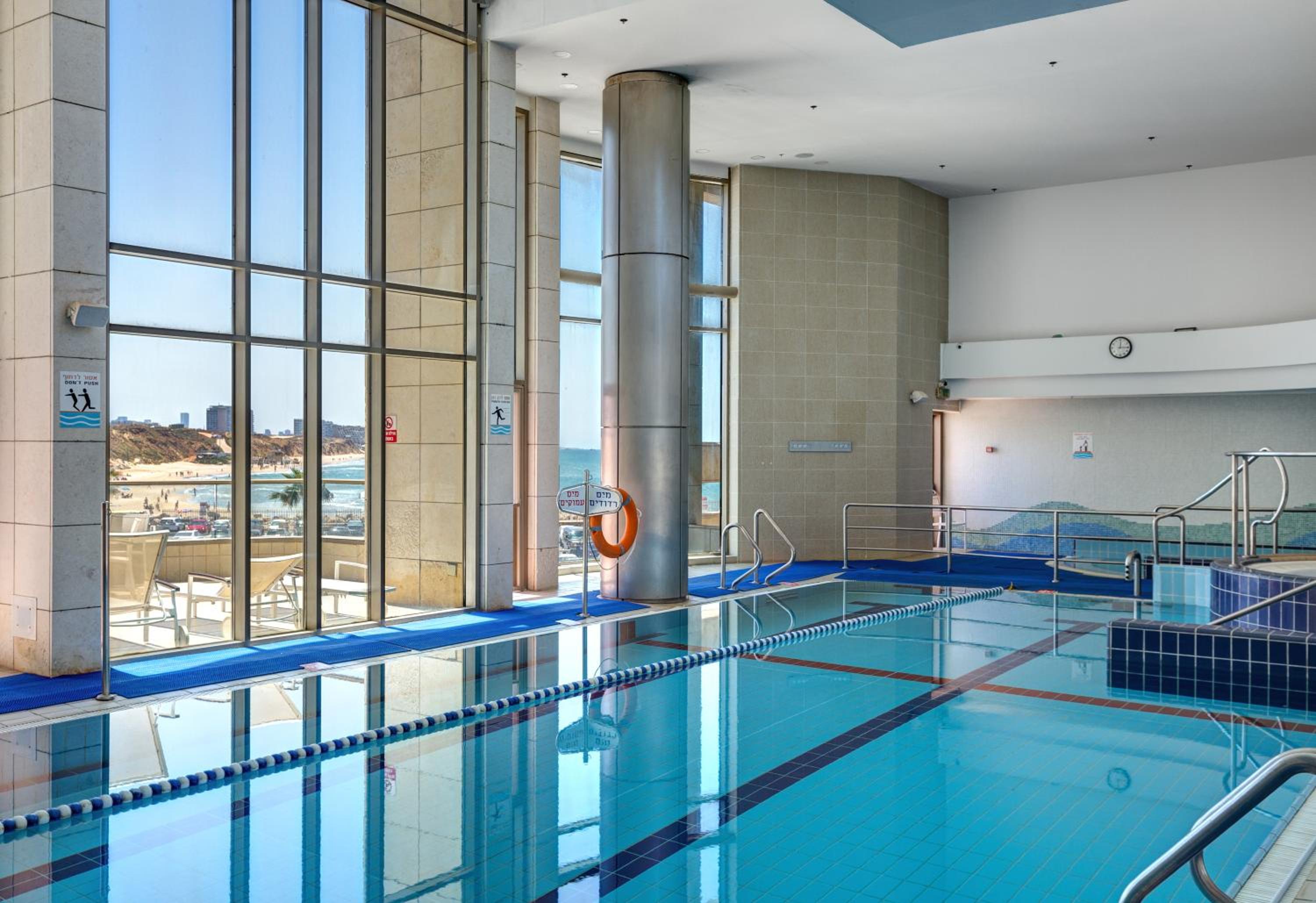 Beautiful 2bd family apt by the beach - pool & parking & gym view 5
