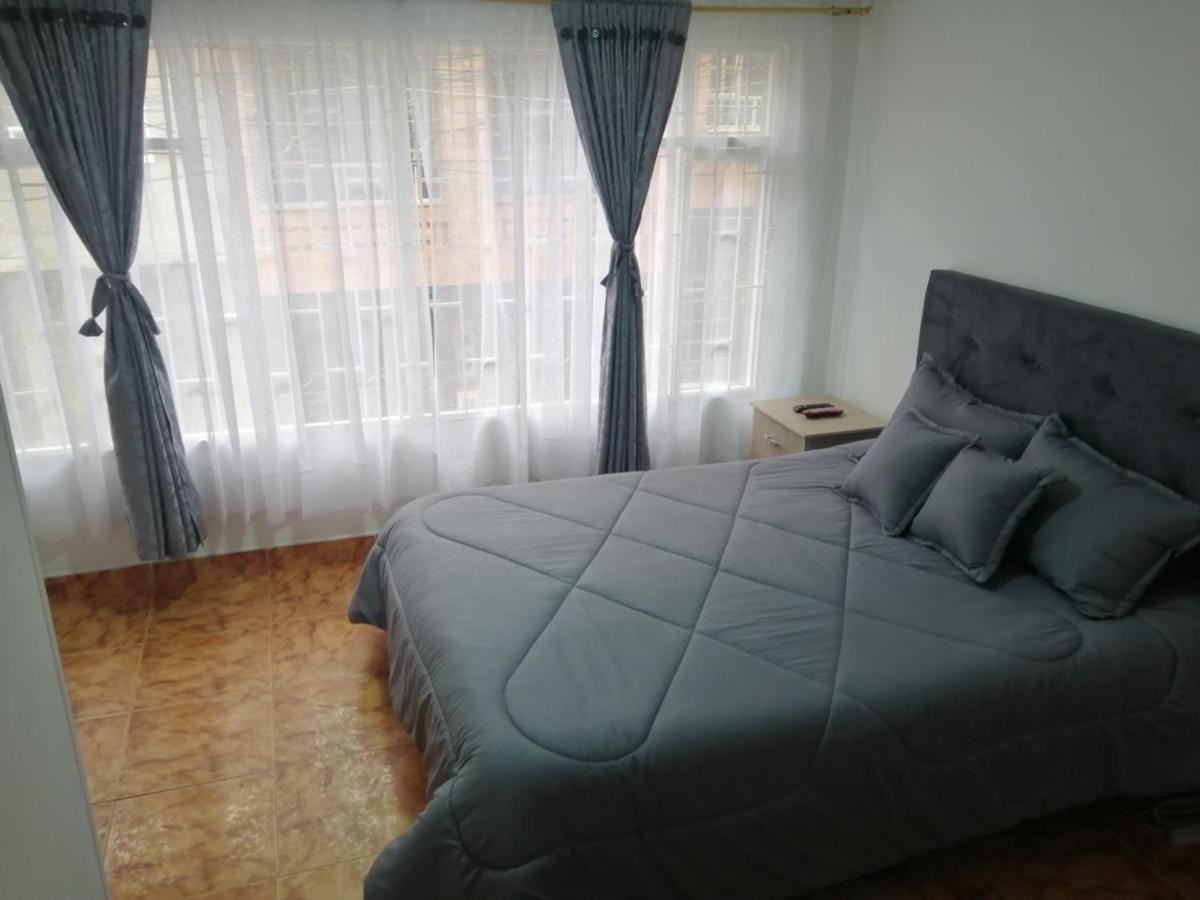 Habitación Privada Cerca al Aeropuerto y Terminal